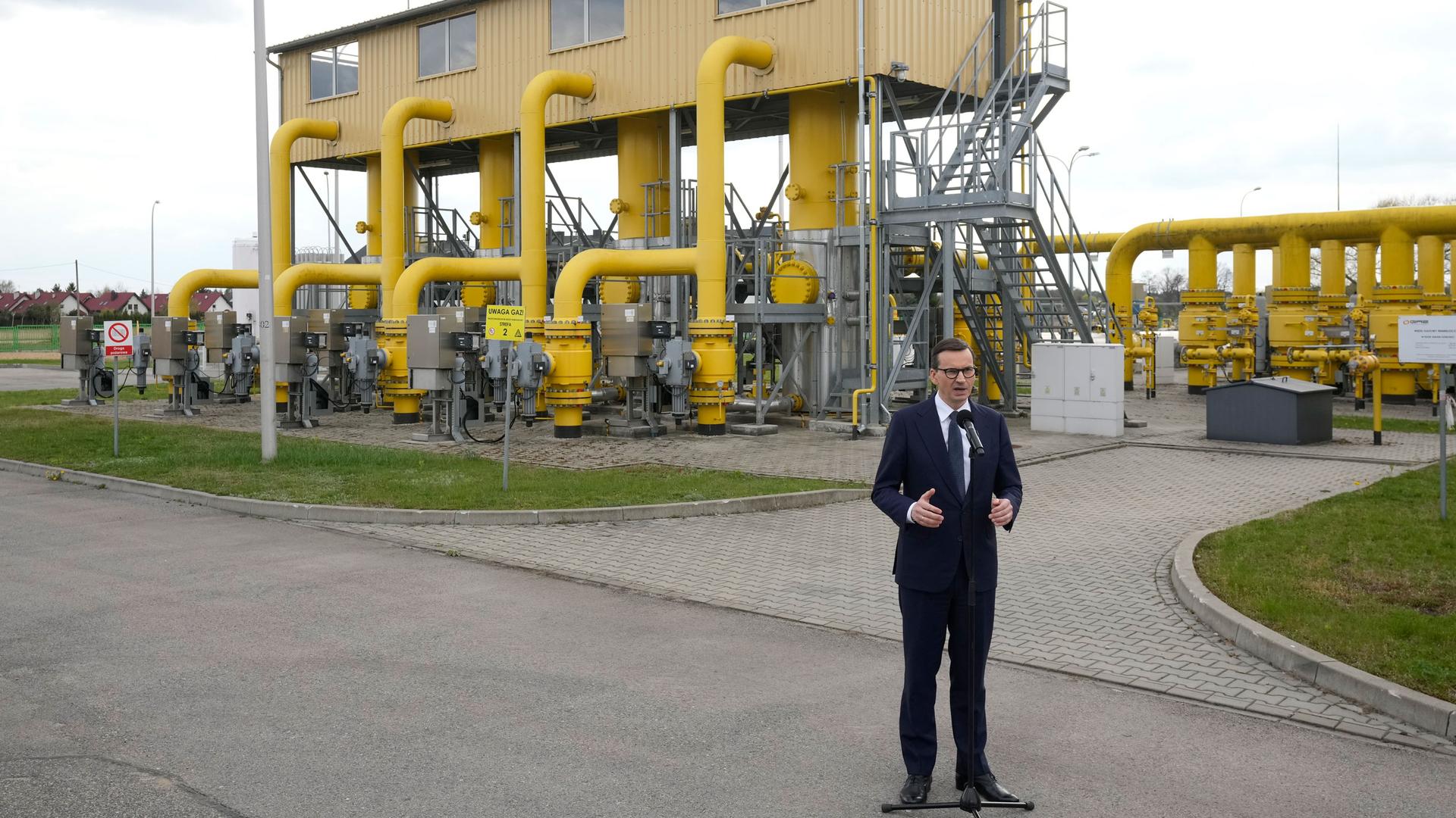 Poland's Prime Minister Mateusz Morawiecki speaks to media at the gas station of Gaz-System in Rembelszczyzna, near Warsaw, Poland, Wednesday, April 27, 2022. 