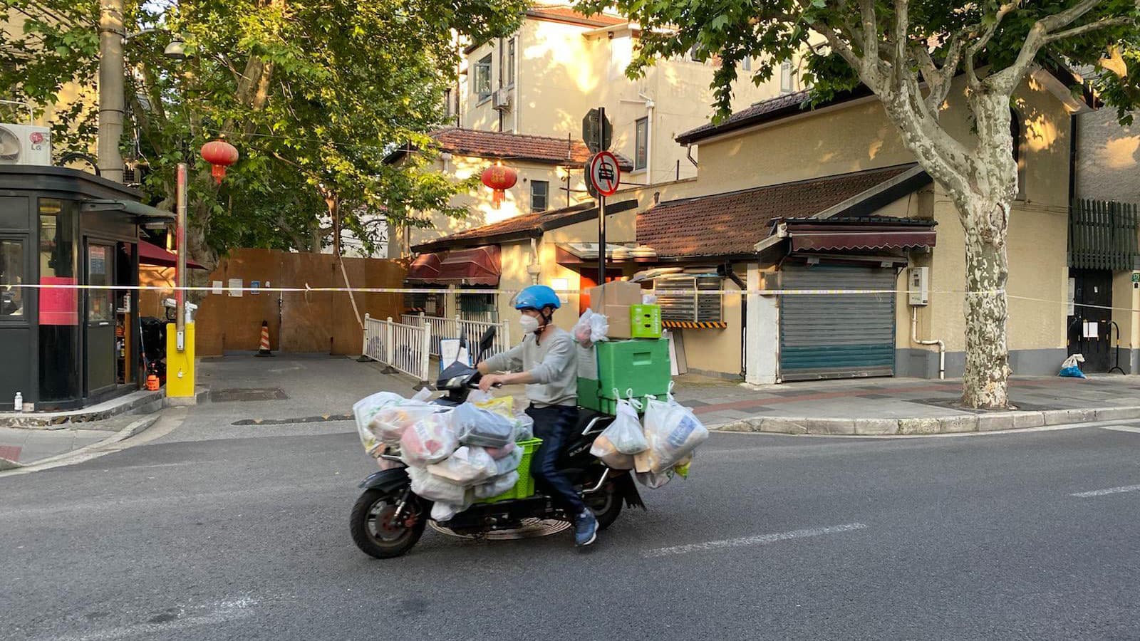 Delivery drivers in Shanghai have been the unsung heroes during a strict COVID-19 lockdown that kept millions indoors.