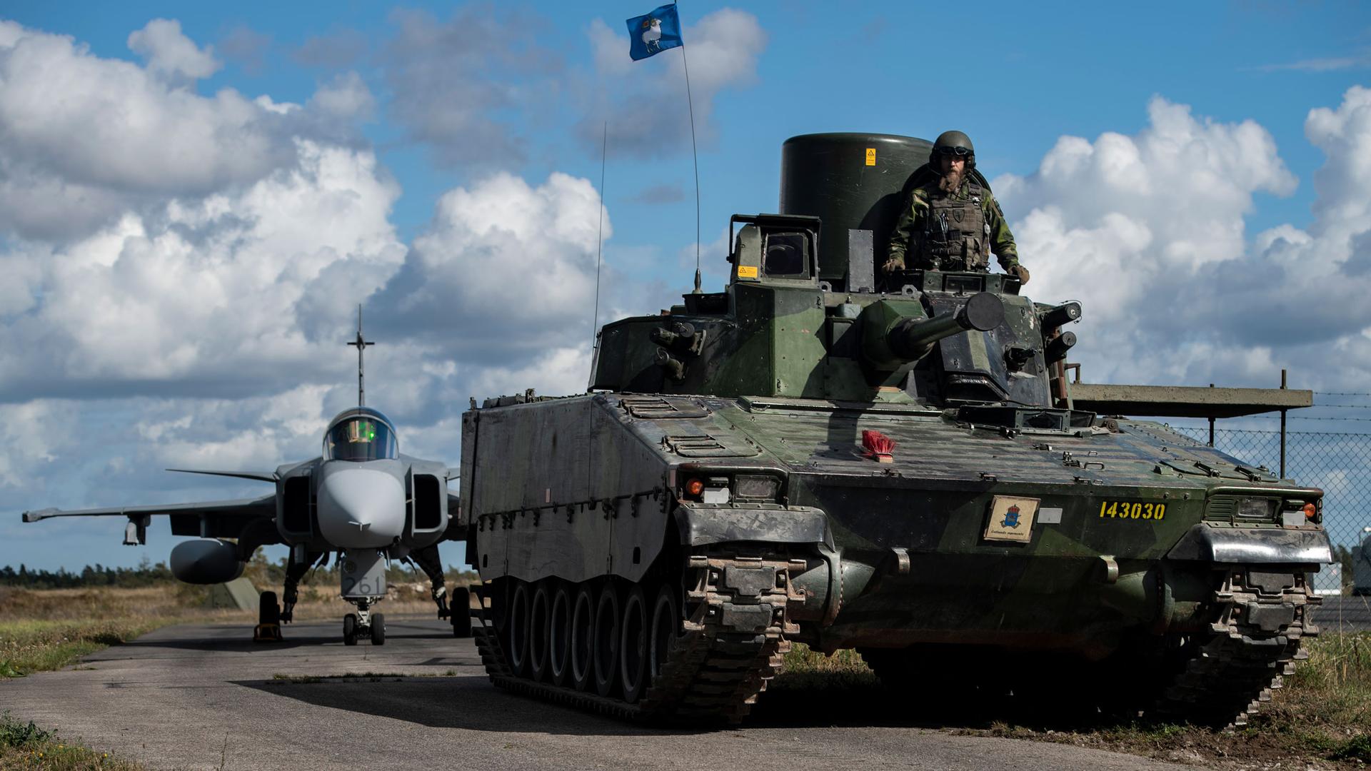 In this photo provided by the Swedish Armed Forces on Aug. 25, 2020, troops prepare in the Baltic Sea region. 