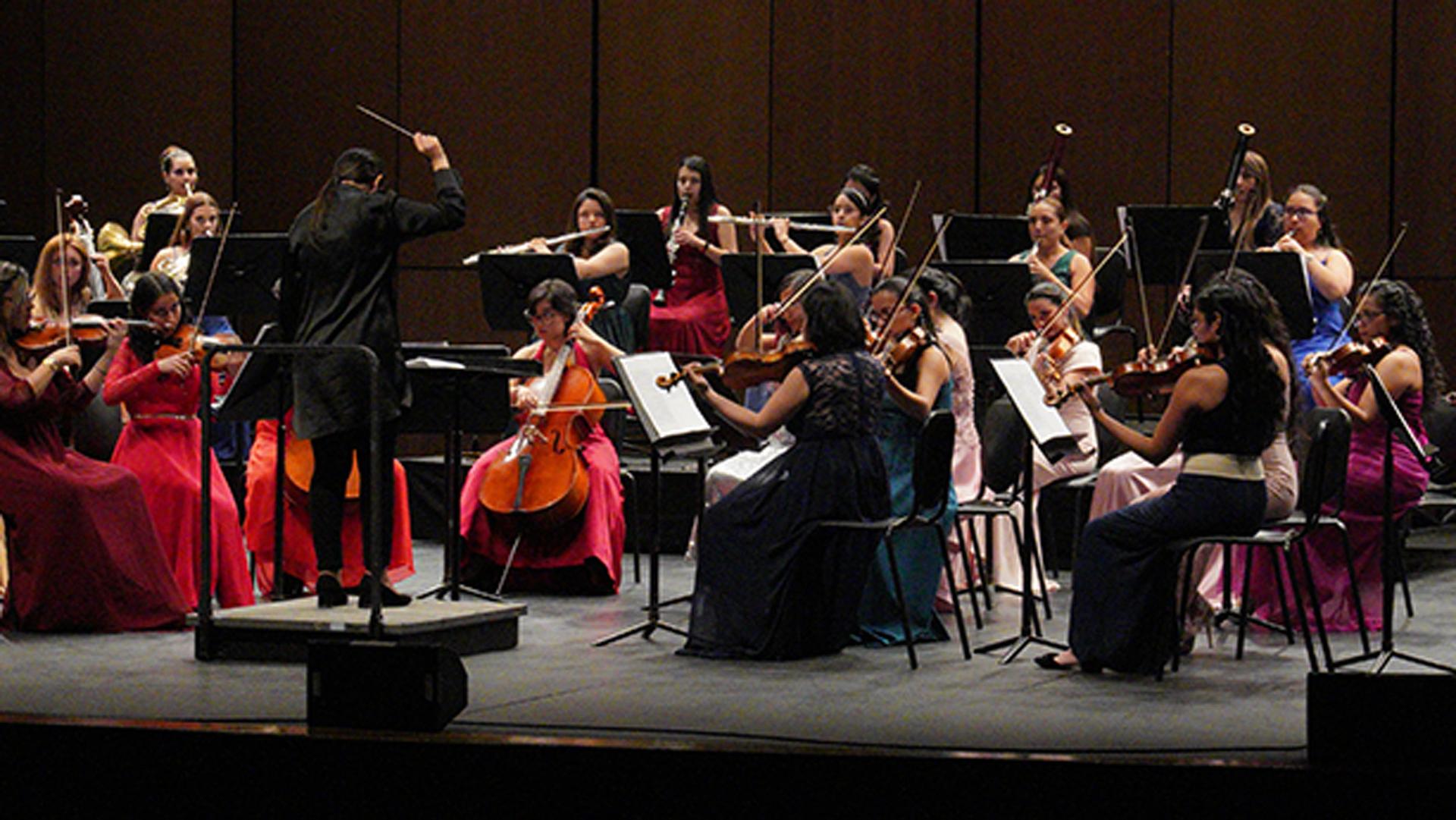 The Bogotá Philharmonic Women's Orchestra performs at the Jorge Eliecer Gaitan theater in Bogotá, Colombia.