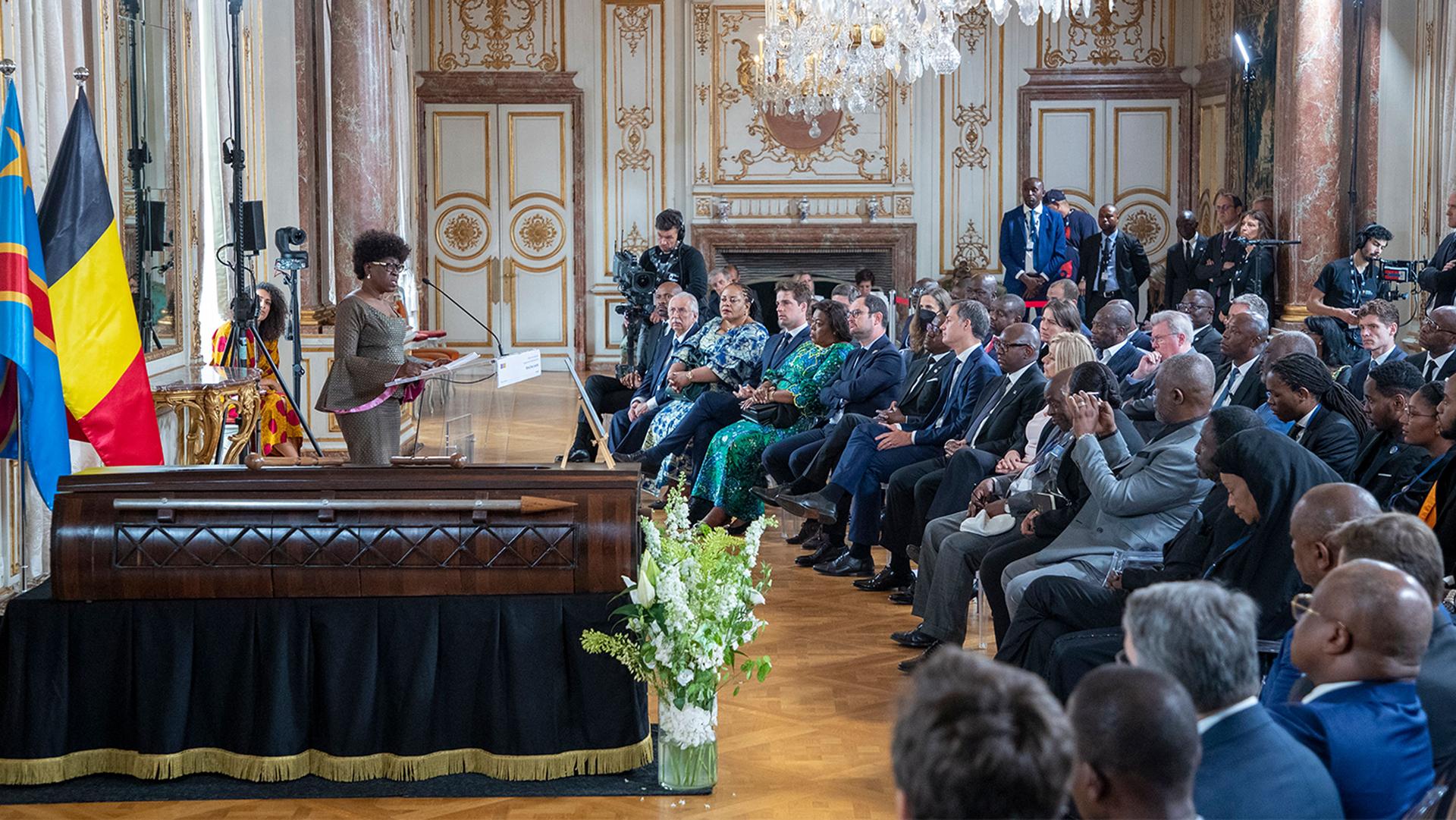 Juliana Lumumba, the daughter of Patrice Lumumba, speaks during a ceremony to return the remains of her father to the family at the Egmont Palace in Brussels