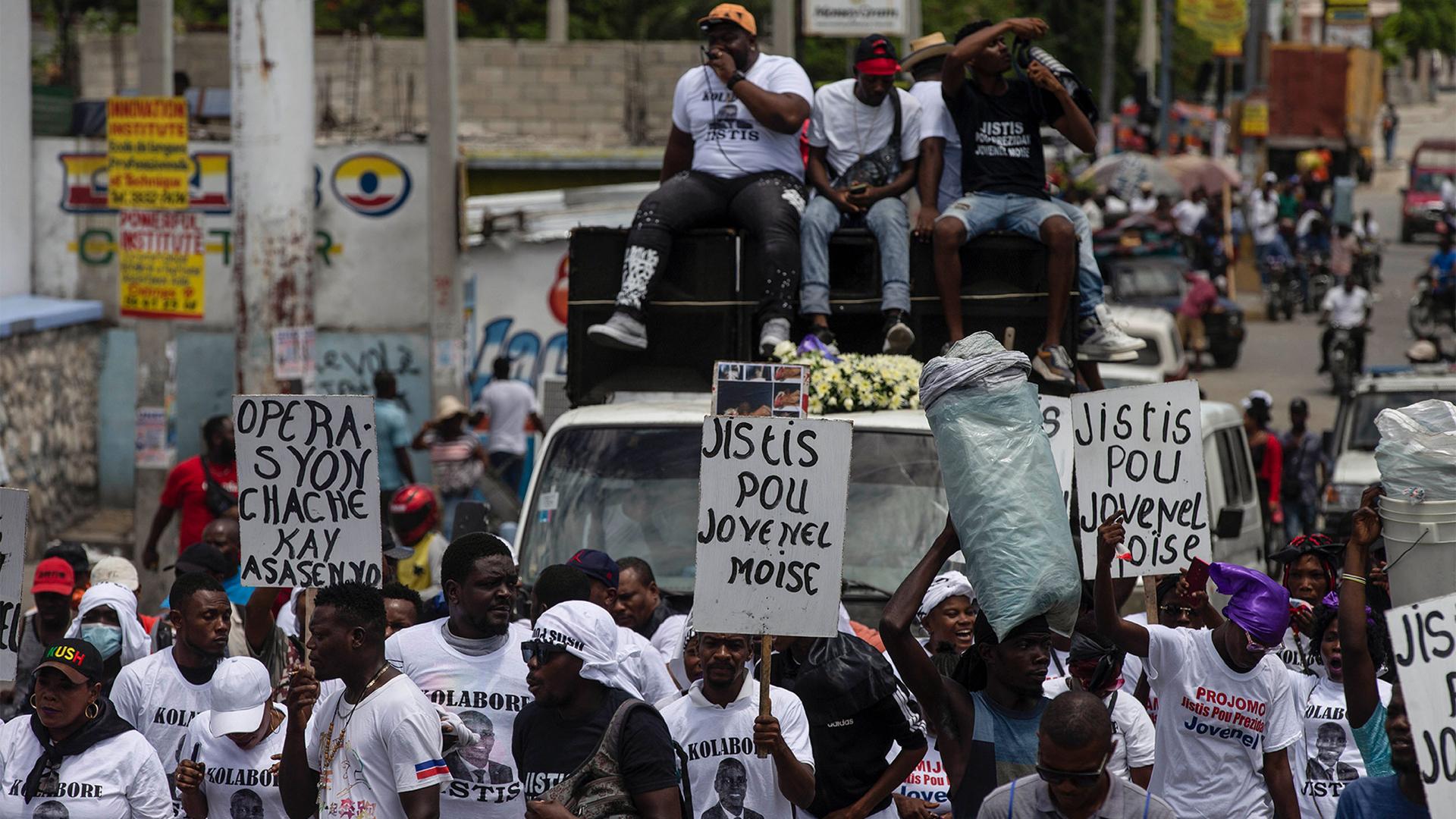 Supporters of slain Haitian President Jovenel Moïse protest to demand justice in Port-au-Prince, Haiti