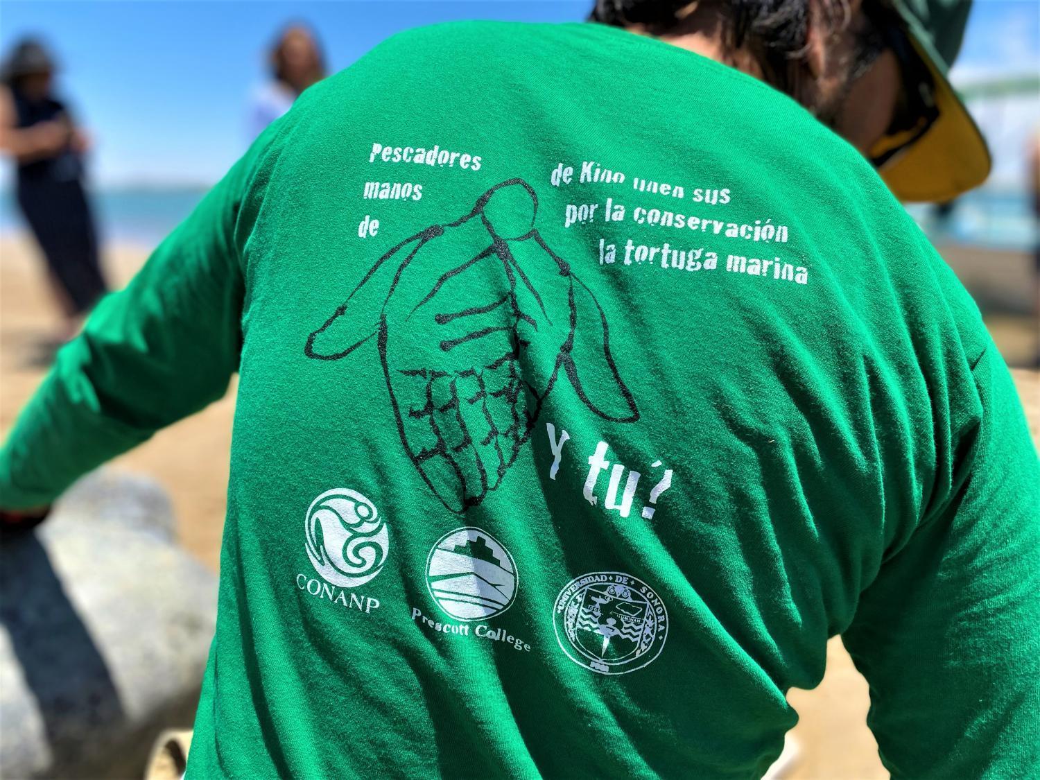 Cosme Becerra, like all of the Kino Bay tortugueros, wears a shirt that describes their conservation work.