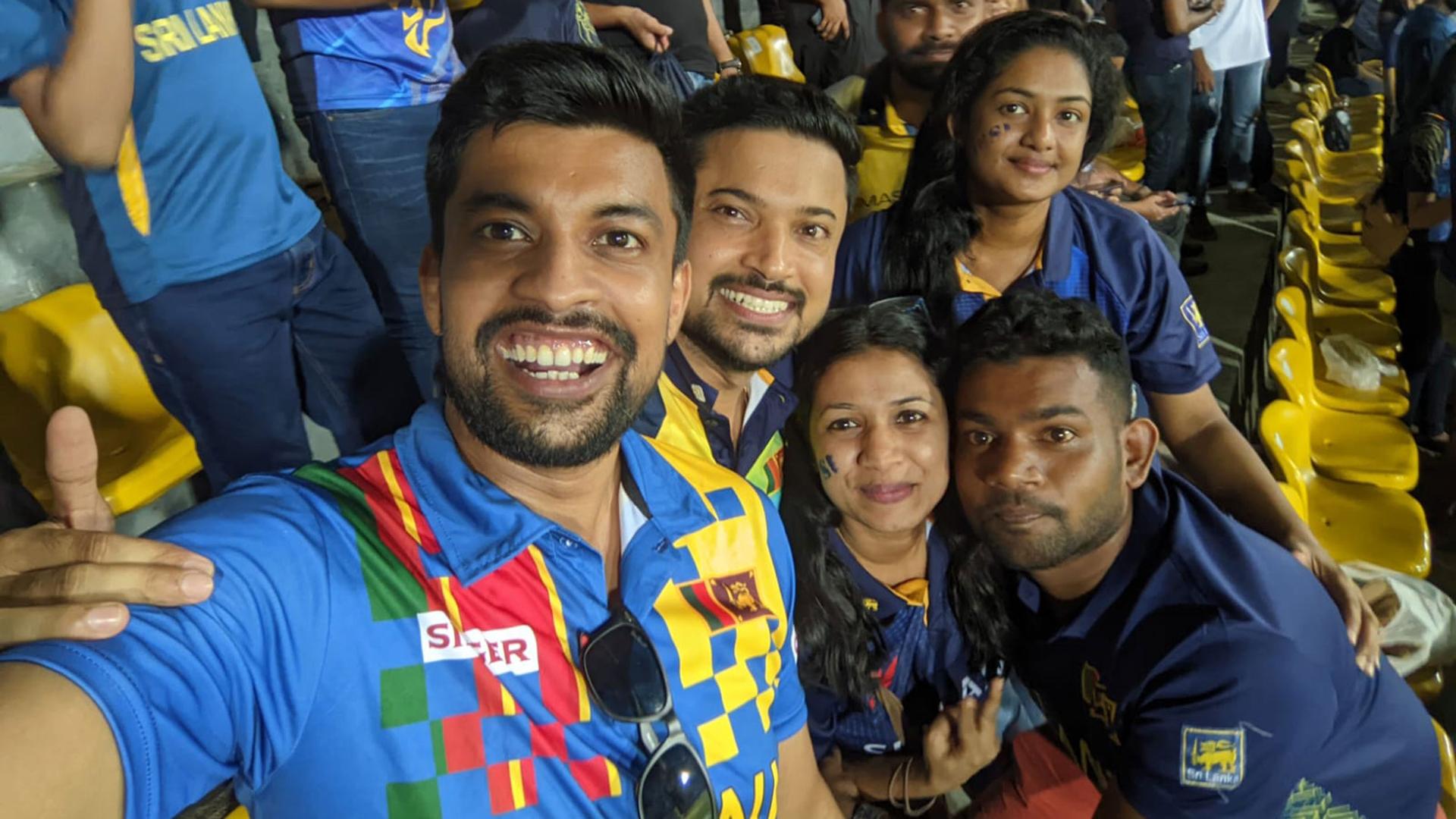 Sri Lankan fans take a selfie during a cricket match with Australia in Colombo.