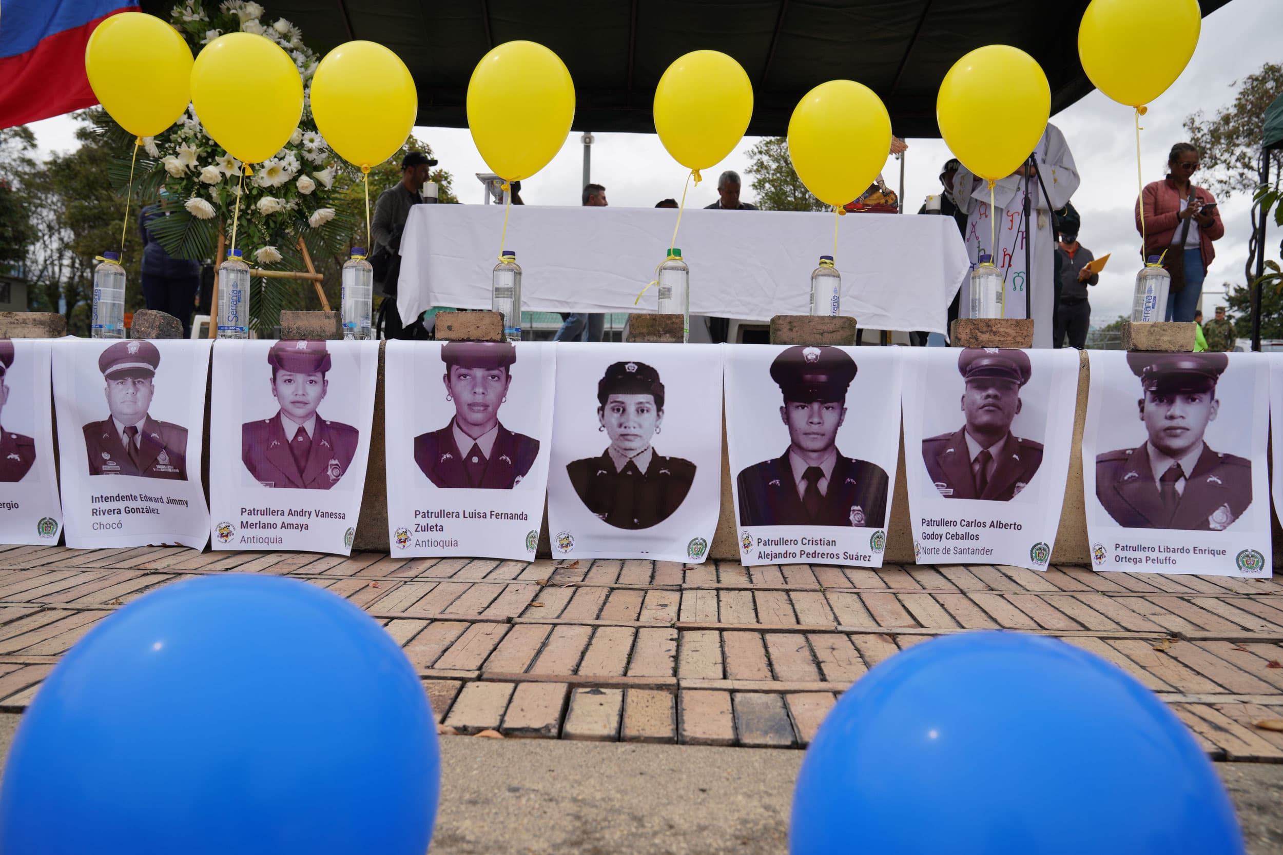At a monument in Bogota demonstrators placed photos of the police officers who have been killed recently.
