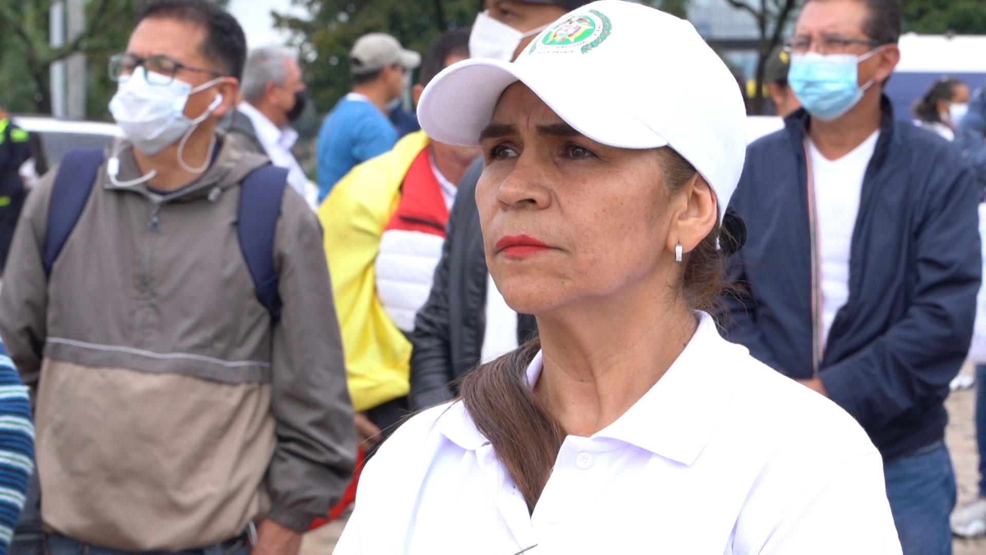 Gladys Aguilera attends a rally in support of police officers in Bogota. Her son is a detective and she’s constantly worried about his safety.