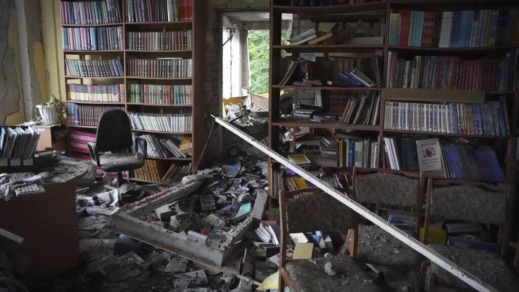 destroyed room with books