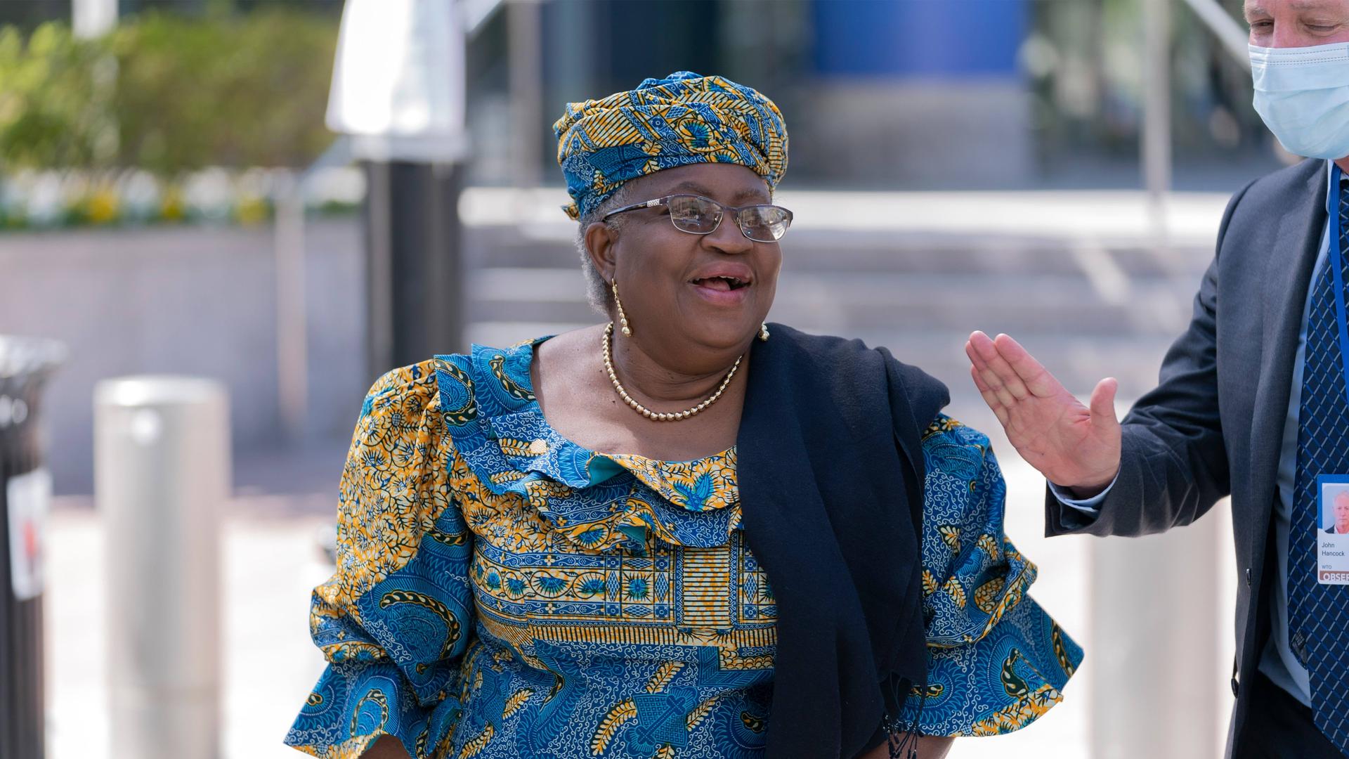 Director General of the World Trade Organization Ngozi Okonjo-Iweala walks outside of the International Monetary Fund building during the World Bank/IMF Spring Meetings in Washington DC in April, 2022. 