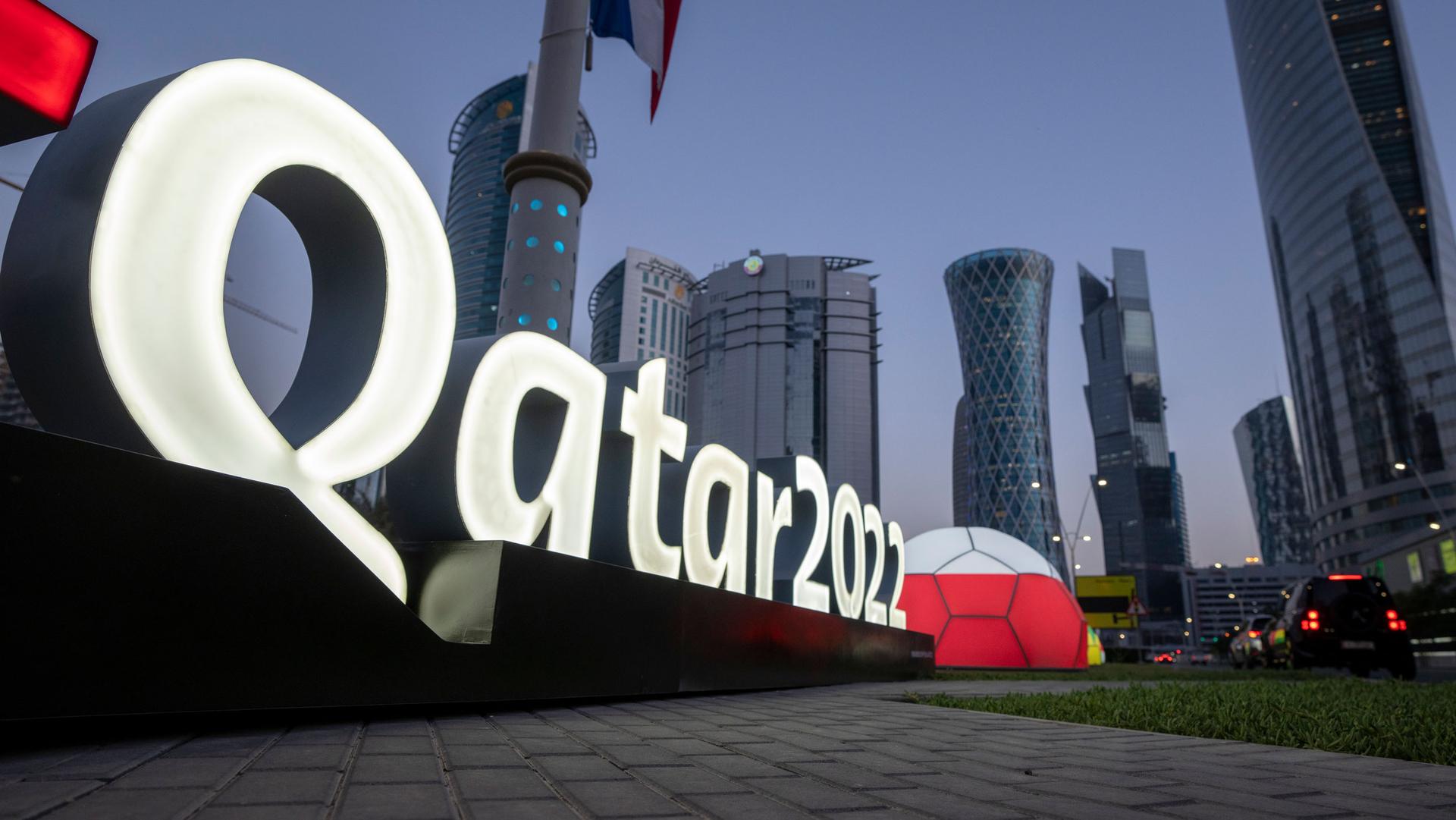 Branding is displayed near the Doha Exhibition and Convention Center, in Doha, Qatar, March 31, 2022.
