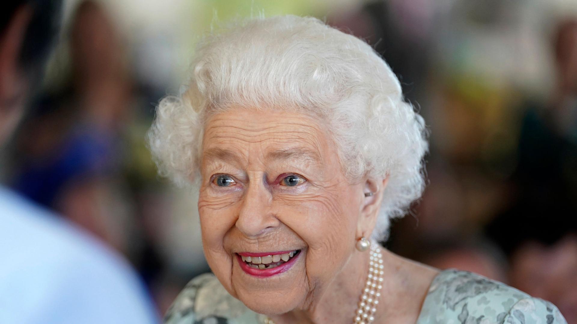 Britain's Queen Elizabeth II looks on during a visit to officially open the new building at Thames Hospice, Maidenhead, England July 15, 2022. 