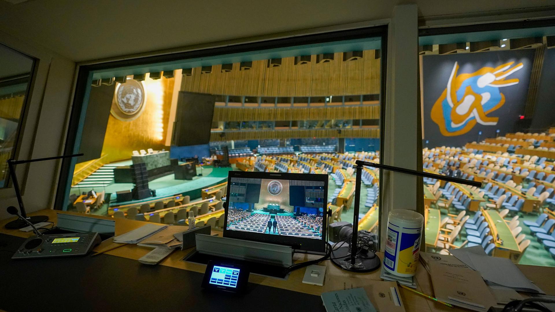 A translators booth overlooks the empty General Assembly hall at United Nations headquarters ahead of the General Assembly, Friday, Sept. 16, 2022.