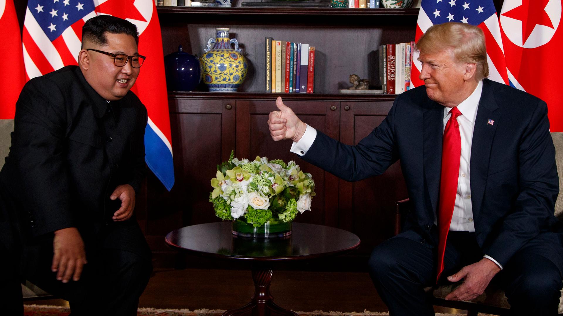 In this June 12, 2018, file photo, US President Donald Trump, right, meets with North Korean leader Kim Jong Un on Sentosa Island, in Singapore. 
