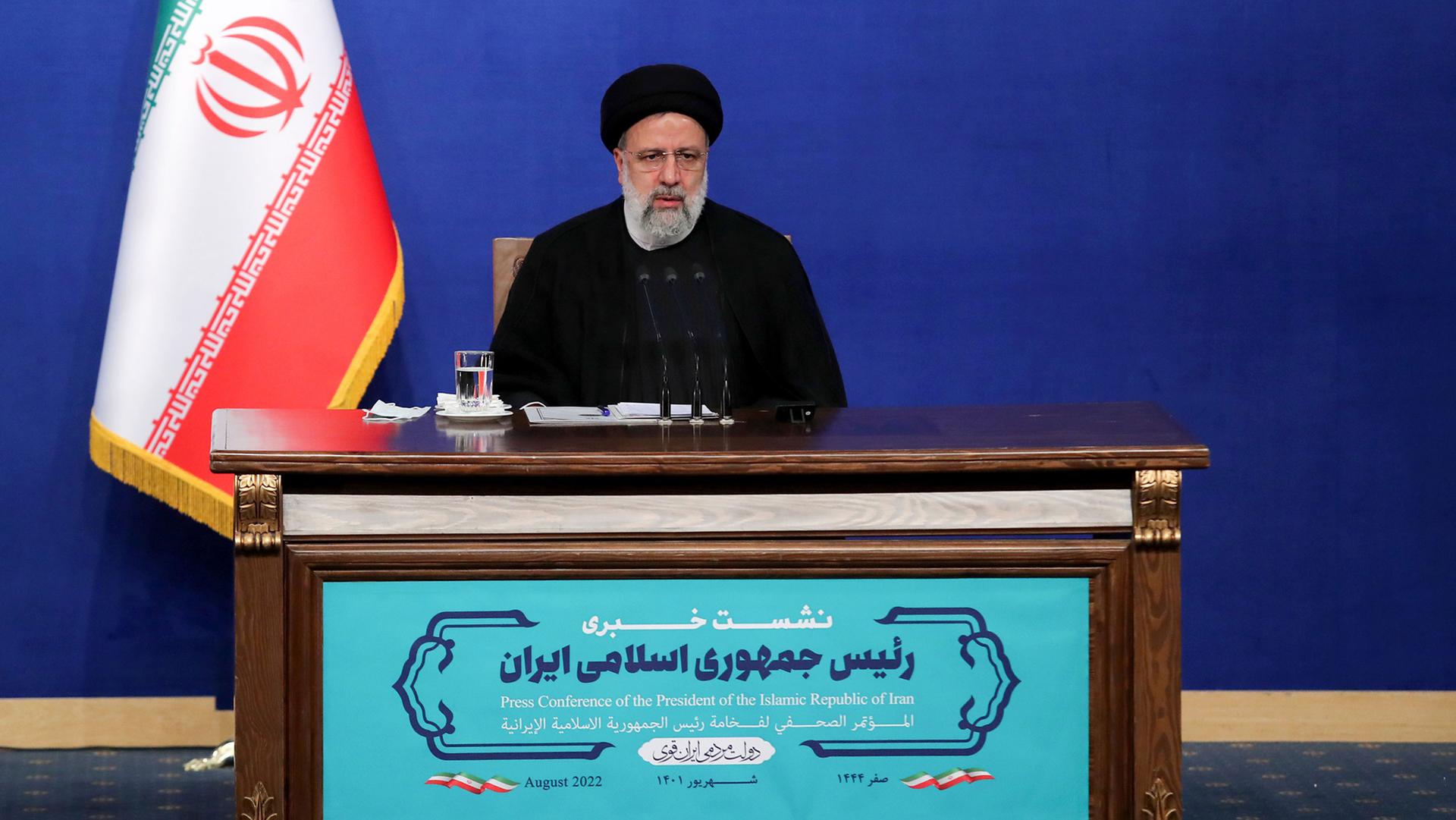 In this photo released by the official website of the office of the Iranian Presidency, President Ebrahim Raisi speaks during his press conference in Tehran, Iran, Monday, Aug. 29, 2022. 