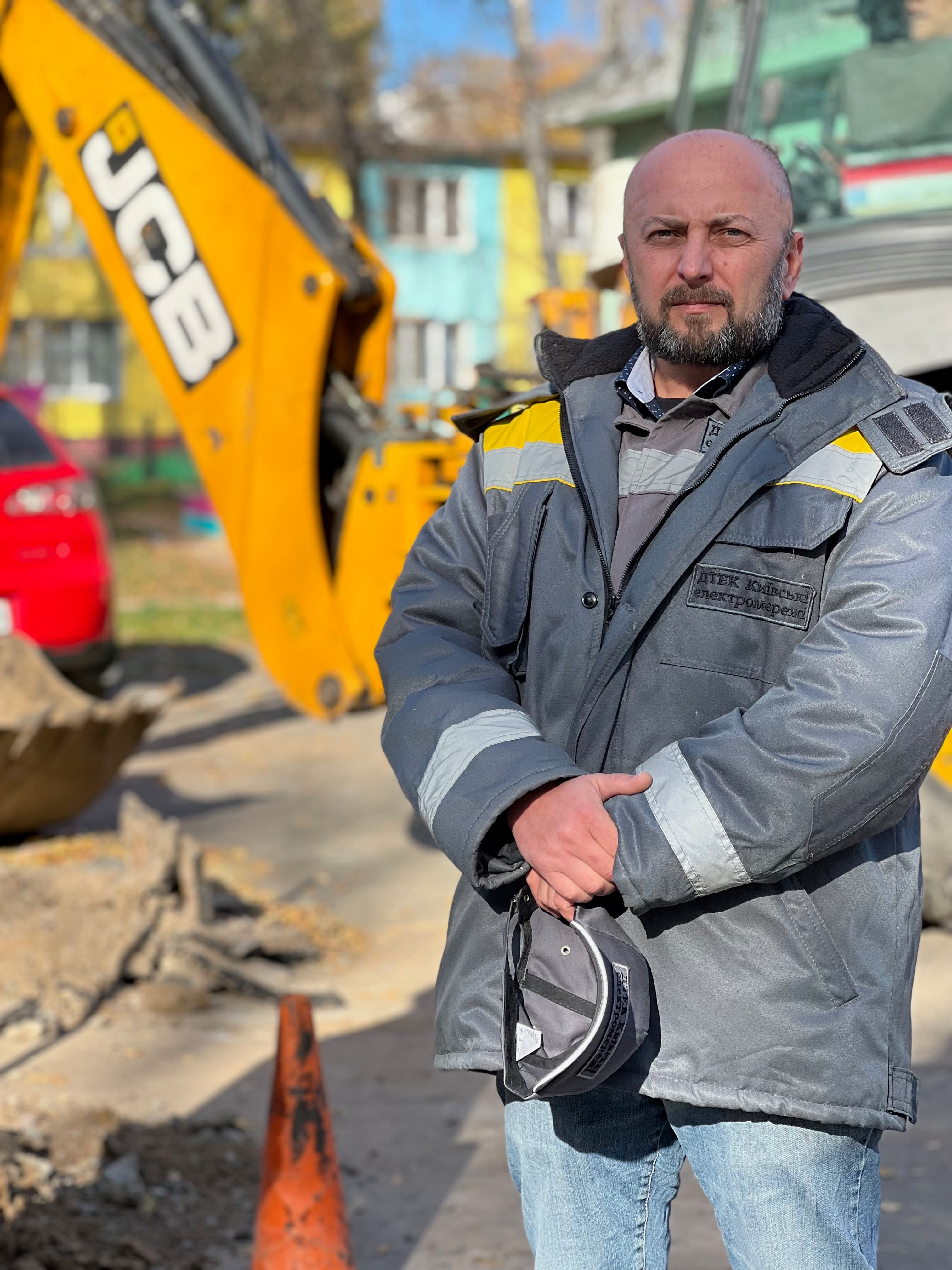 worker with coat on