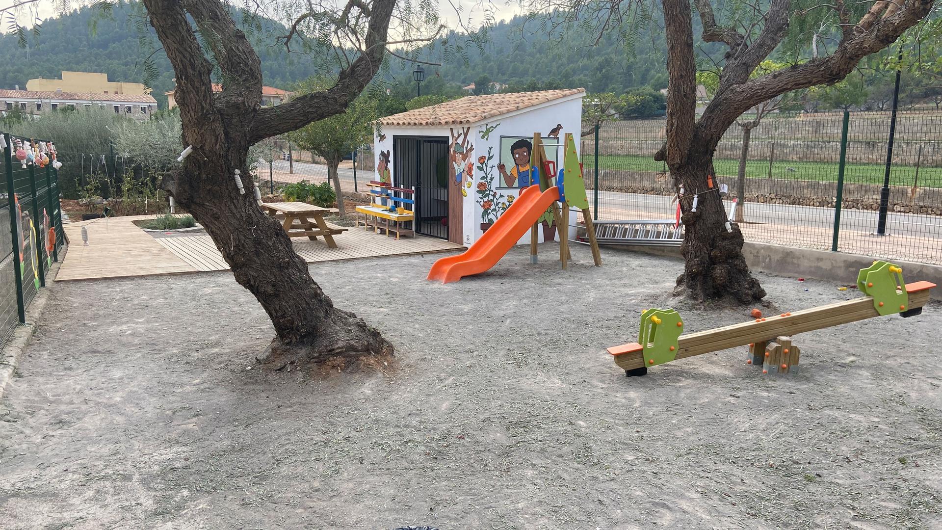 Parents in Argelita fixed up this abandoned lot adjacent to the new school, turned it into a playground and garden.