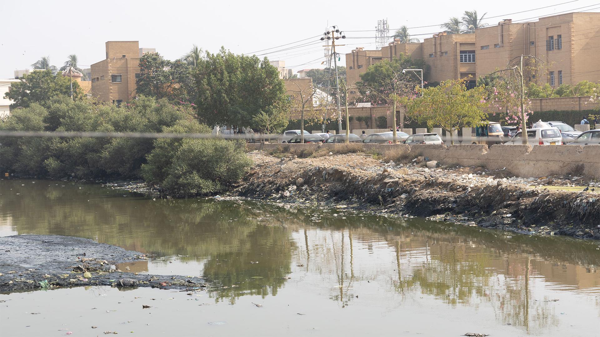 The Nehr-i-Khayyam drainage ditch in Karachi, Pakistan, where sewage and trash collect and can impede the flow of stormwater.