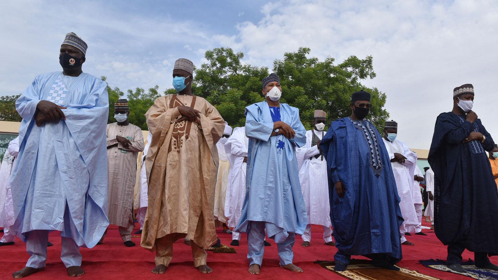 Muslims in Nigeria attend Eid prayers at the Kofar Mata prayer ground in Kano Nigeria, Sunday, May 24, 2020. 