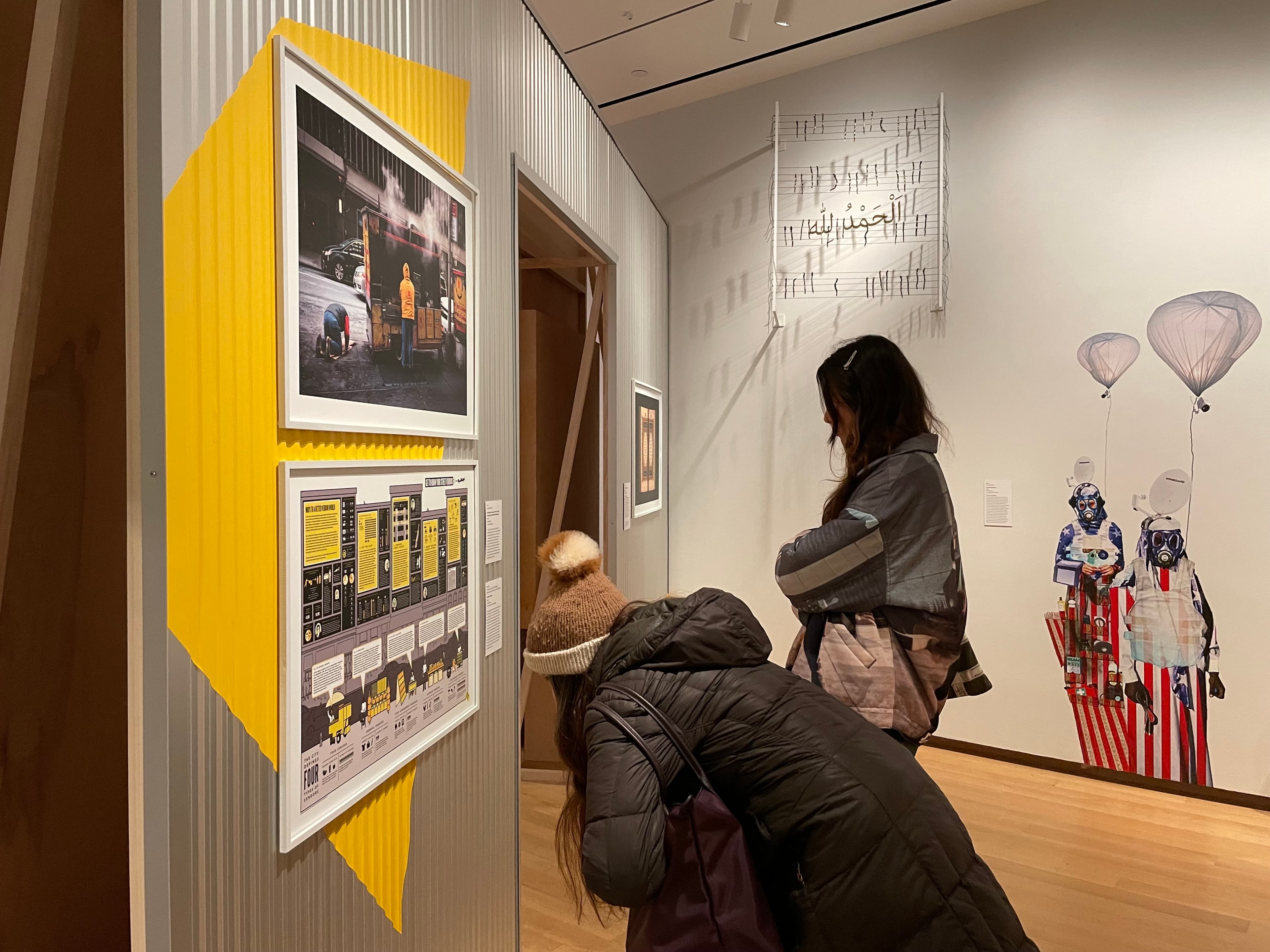 Visitors examine the displays at the