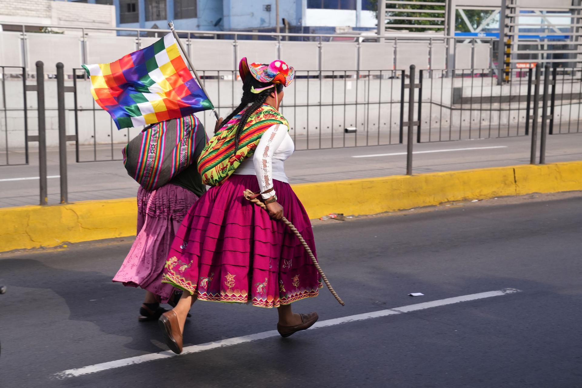 Indigenous activists run through the streets of Lima during a recent protest against Dina Boluarte's goverment. 