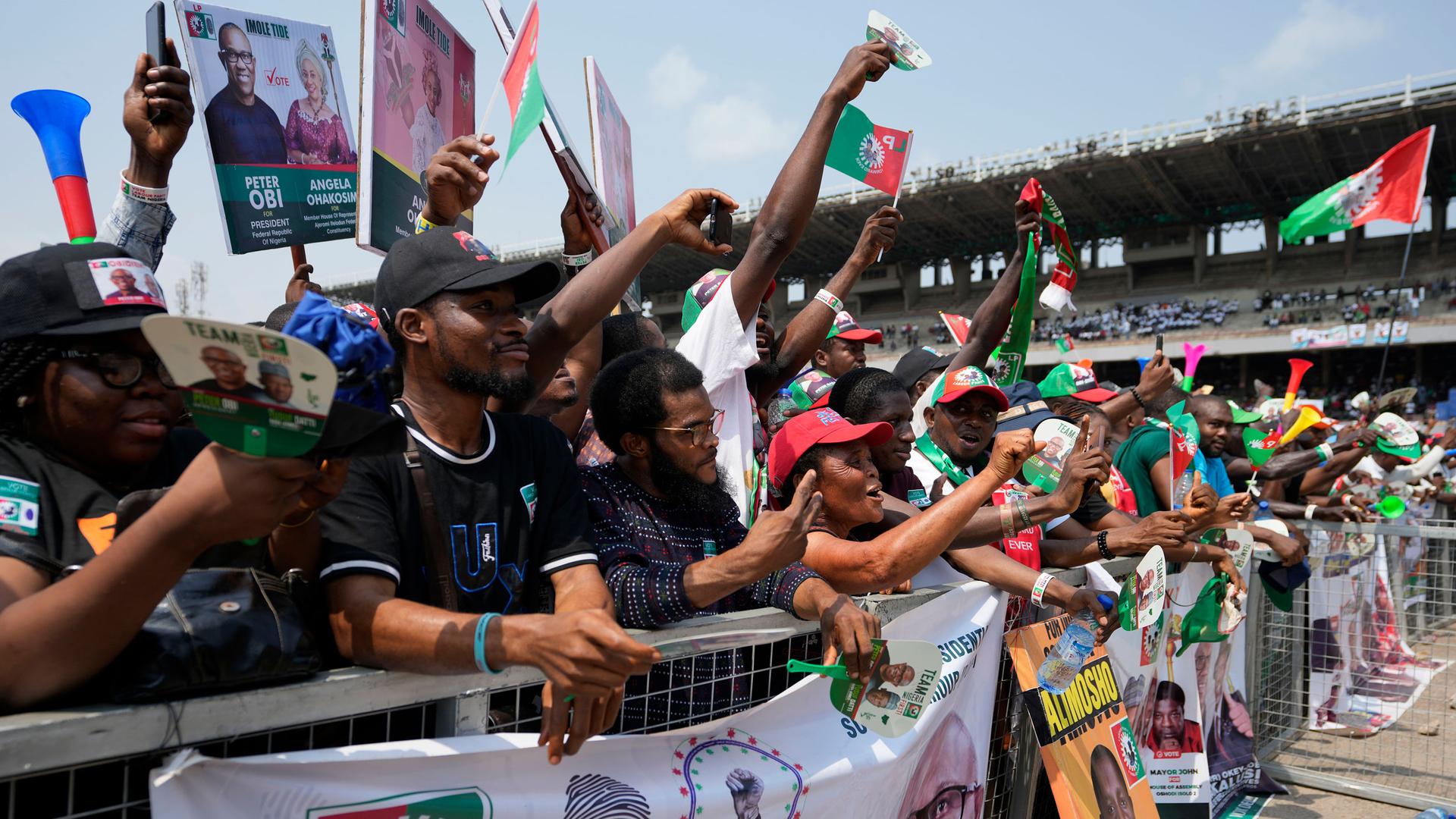 Supporters of Nigeria's Labour Party's Presidential Candidate Peter Obi, chants during an election campaign rally at the Tafawa Balewa Square in Lagos Nigeria, Saturday, Feb. 11, 2023. 