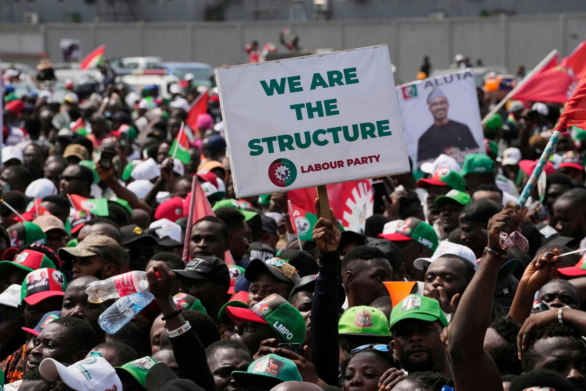 Supporters of Nigeria's Labour Party's Presidential Candidate Peter Obi, chants during an election campaign rally at the Tafawa Balewa Square in Lagos, Nigeria, Saturday, Feb. 11, 2023. 