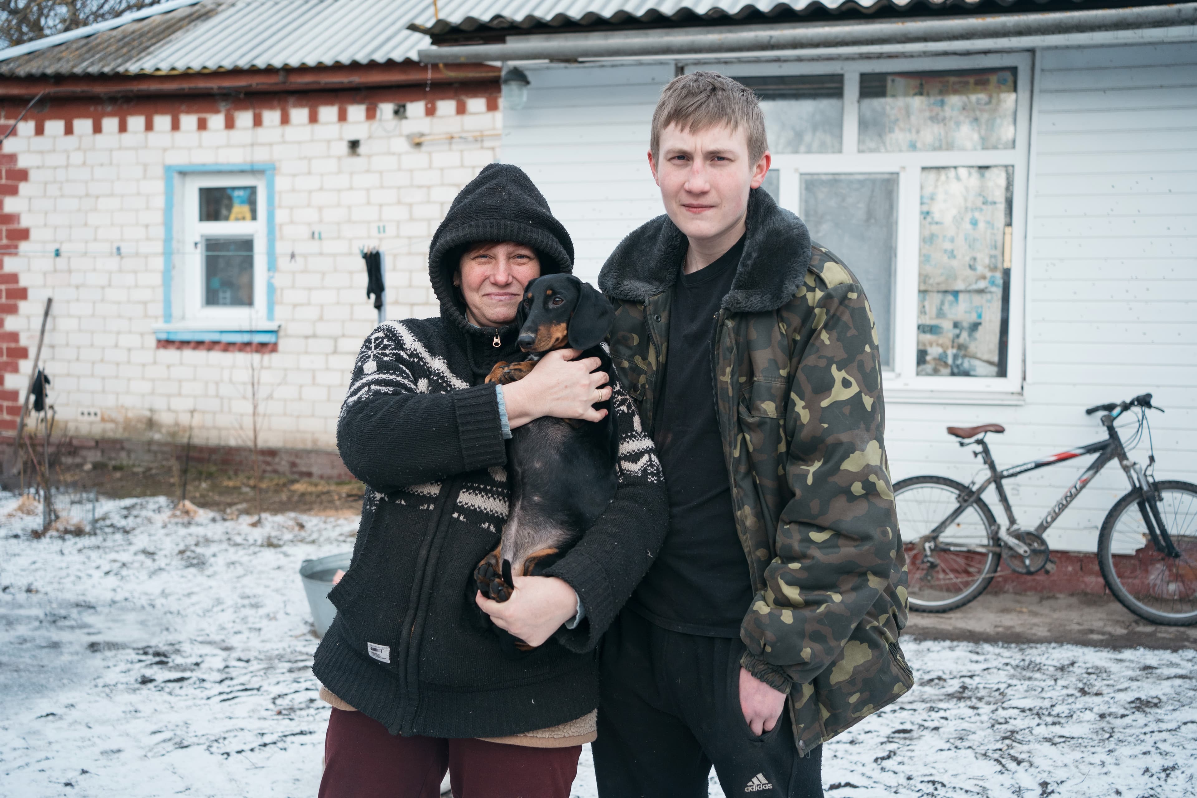 woman, son and dog