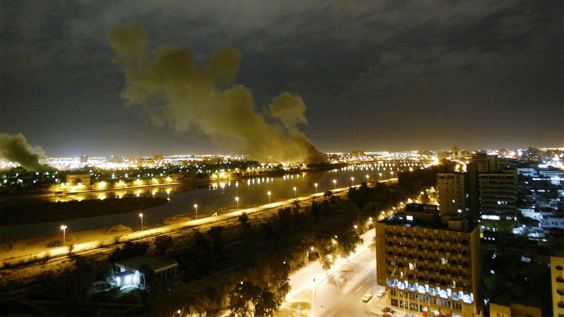 Smoke rises from the Trade Ministry in Baghdad after it was hit by a missile during US-led attacks, March 20, 2003.