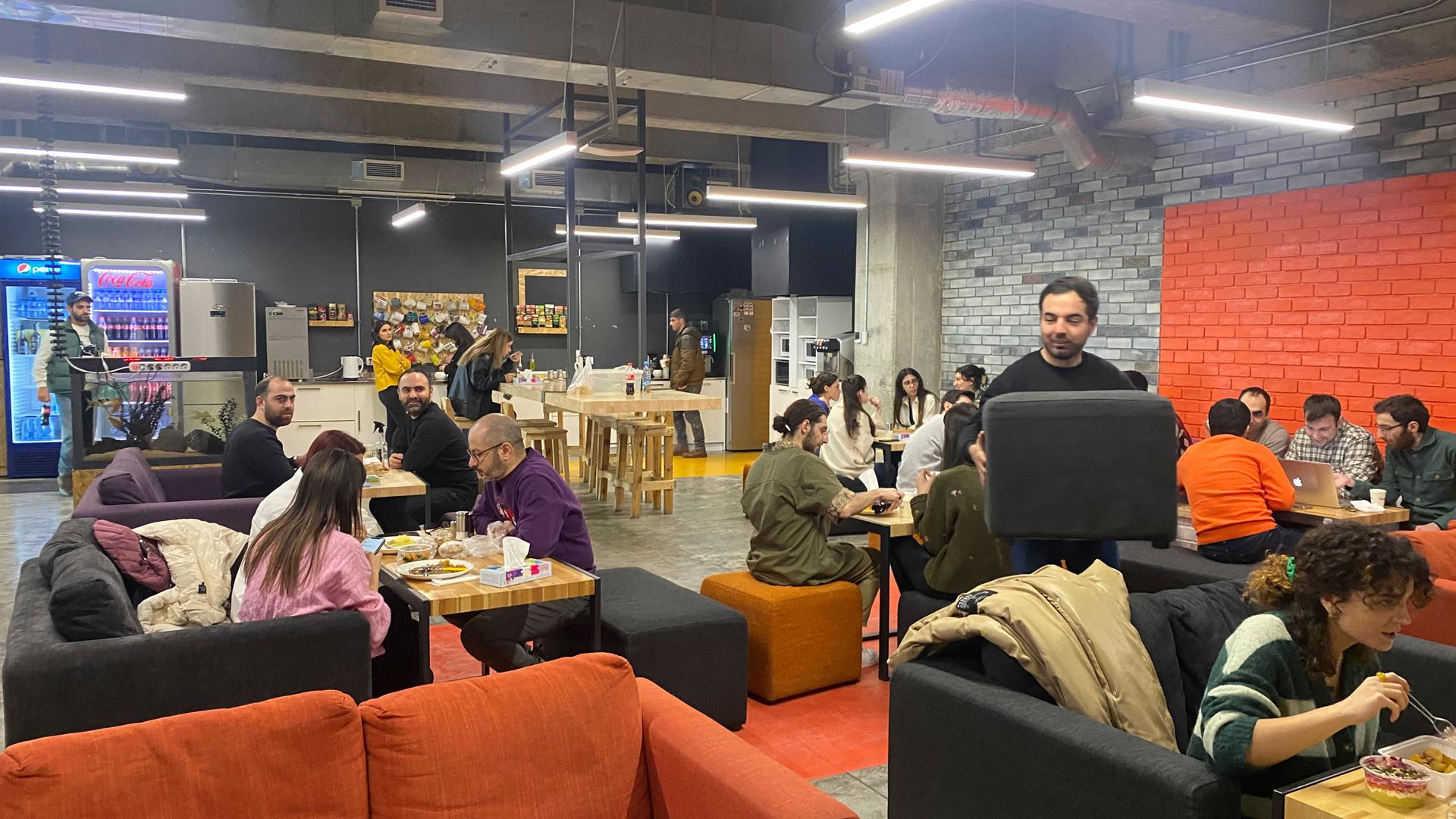 Colleagues gather at a cafeteria in the offices of Picsart, in Yerevan, Armenia.