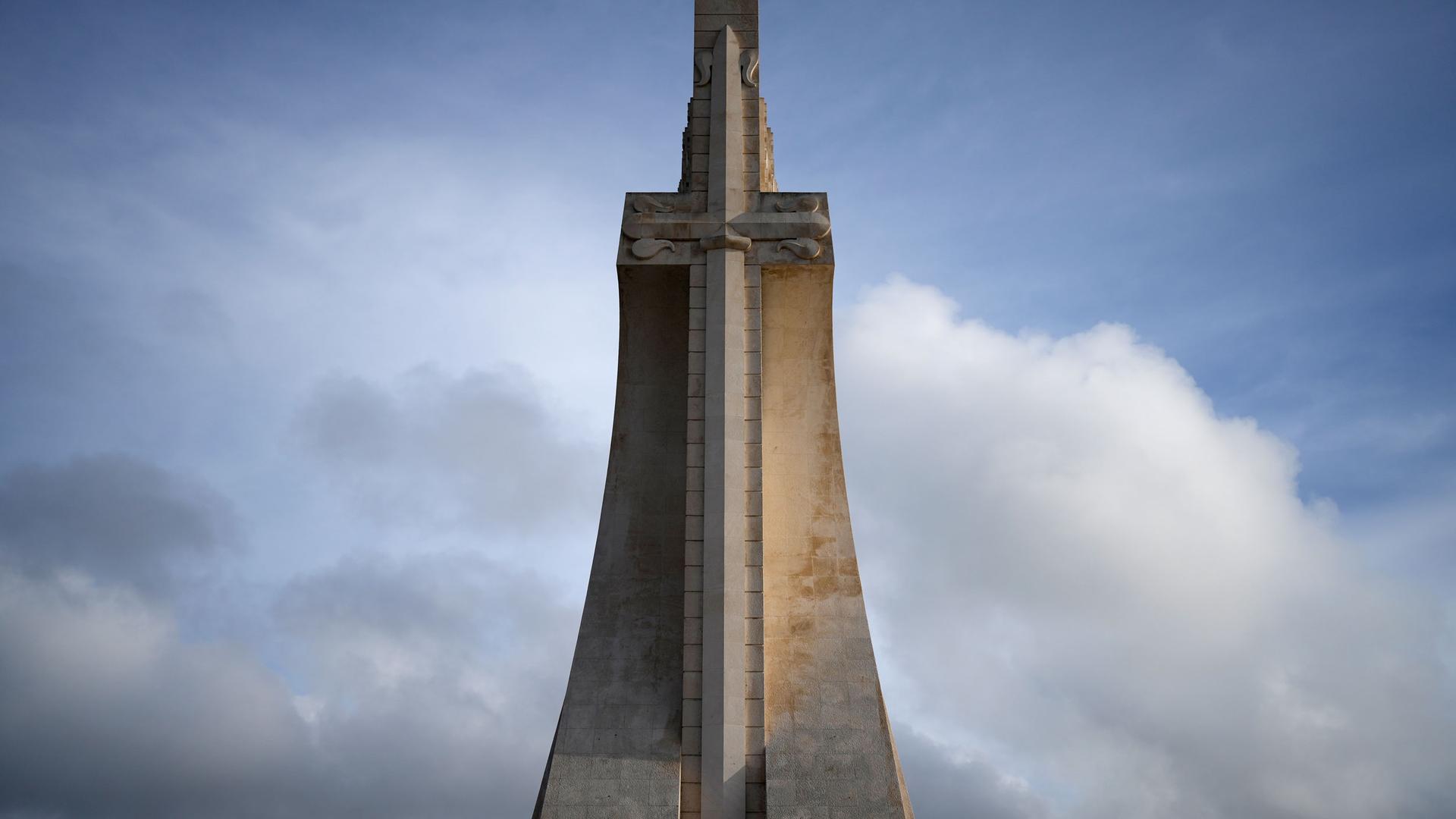 The sword of the Royal House of Avis on a stylized cross decorates the 56-meter high Monument to the Discoveries by the Tagus river in Lisbon, Thursday, March 30, 2023. 
