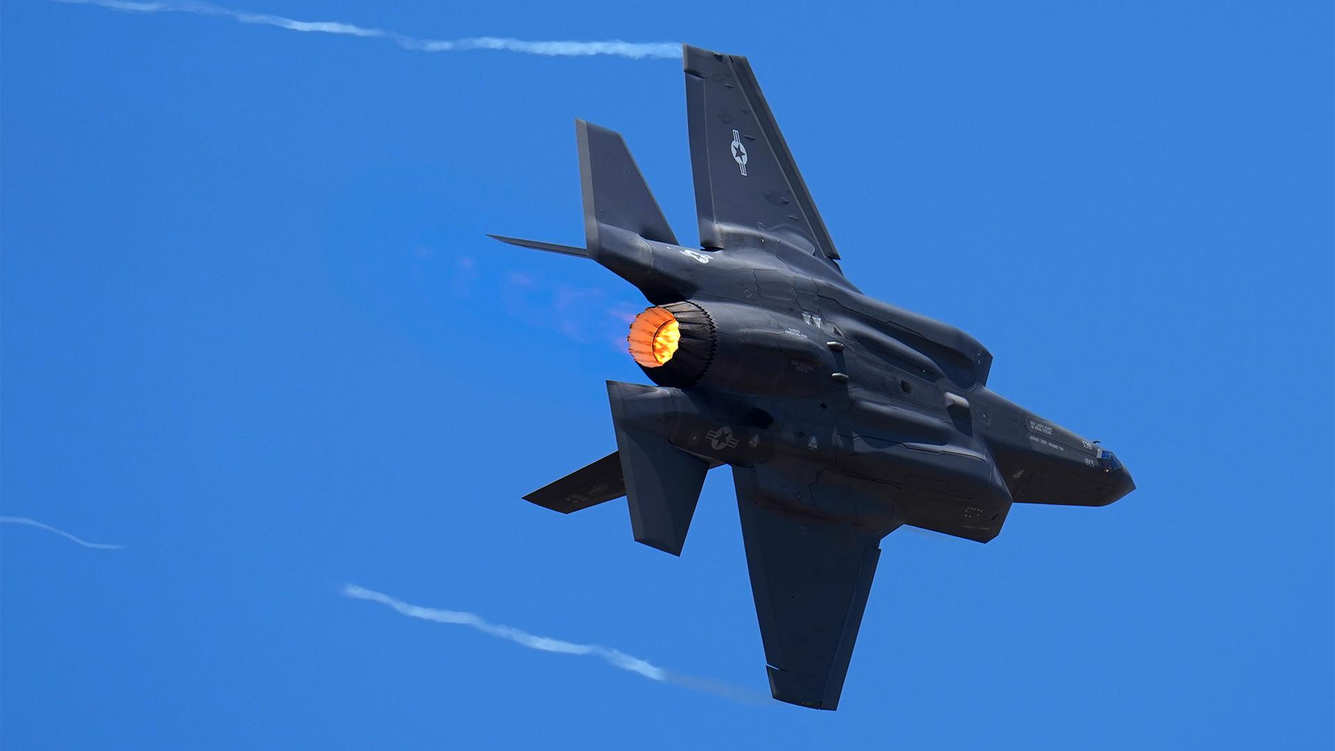 US Air Force fighter aircraft F-35 performs aerobatic maneuvers on the second day of the Aero India 2023 at Yelahanka air base in Bengaluru, India, Feb. 14, 2023.