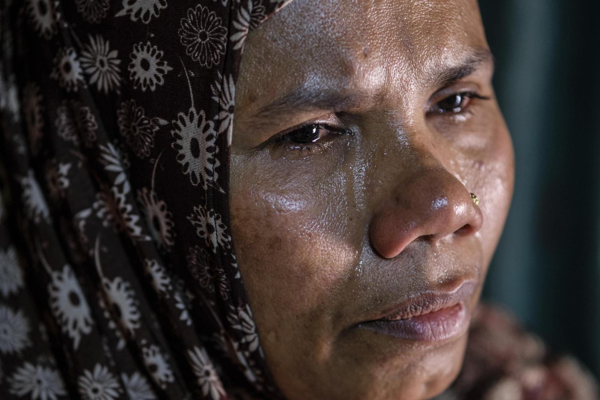 A closeup photo of a woman crying