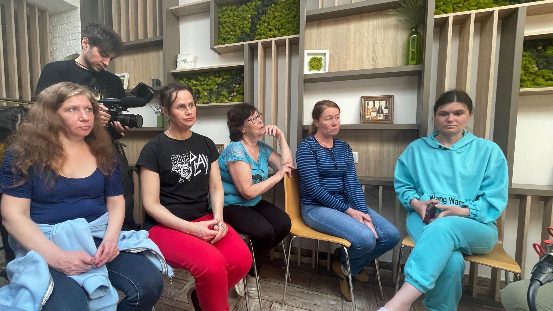 A group of mothers and guardians meet to discuss an upcoming trip to Russia and occupied parts of Ukraine to retrieve their missing children.
