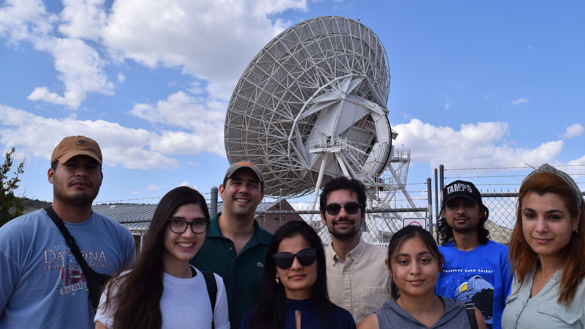 Professor Juan Madrid with his students from the University of Texas Rio Grande Valley at a radio telescope in Fort Davis in West Texas.