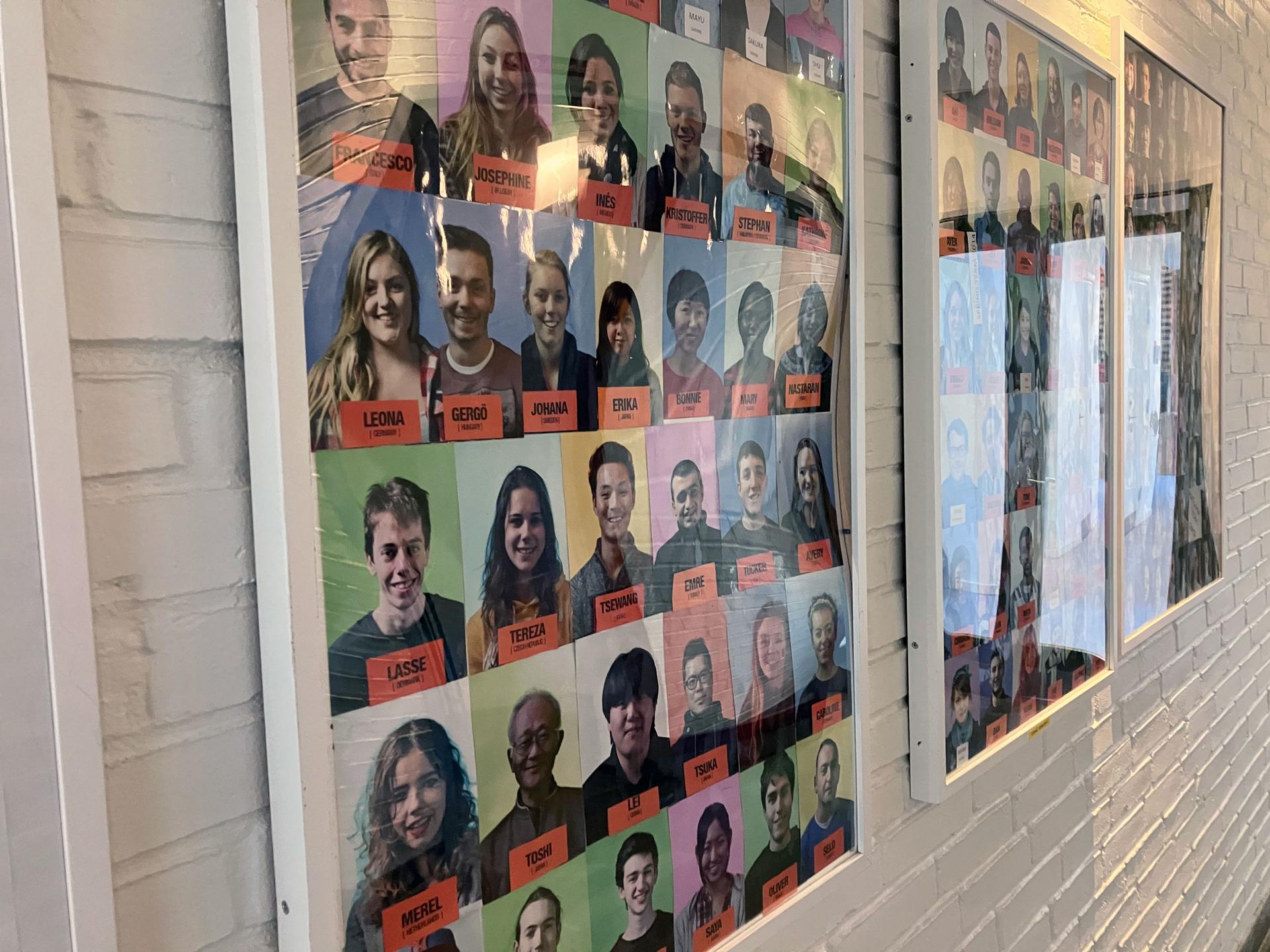 IPC hallways are adorned with photos of international students from around the world.