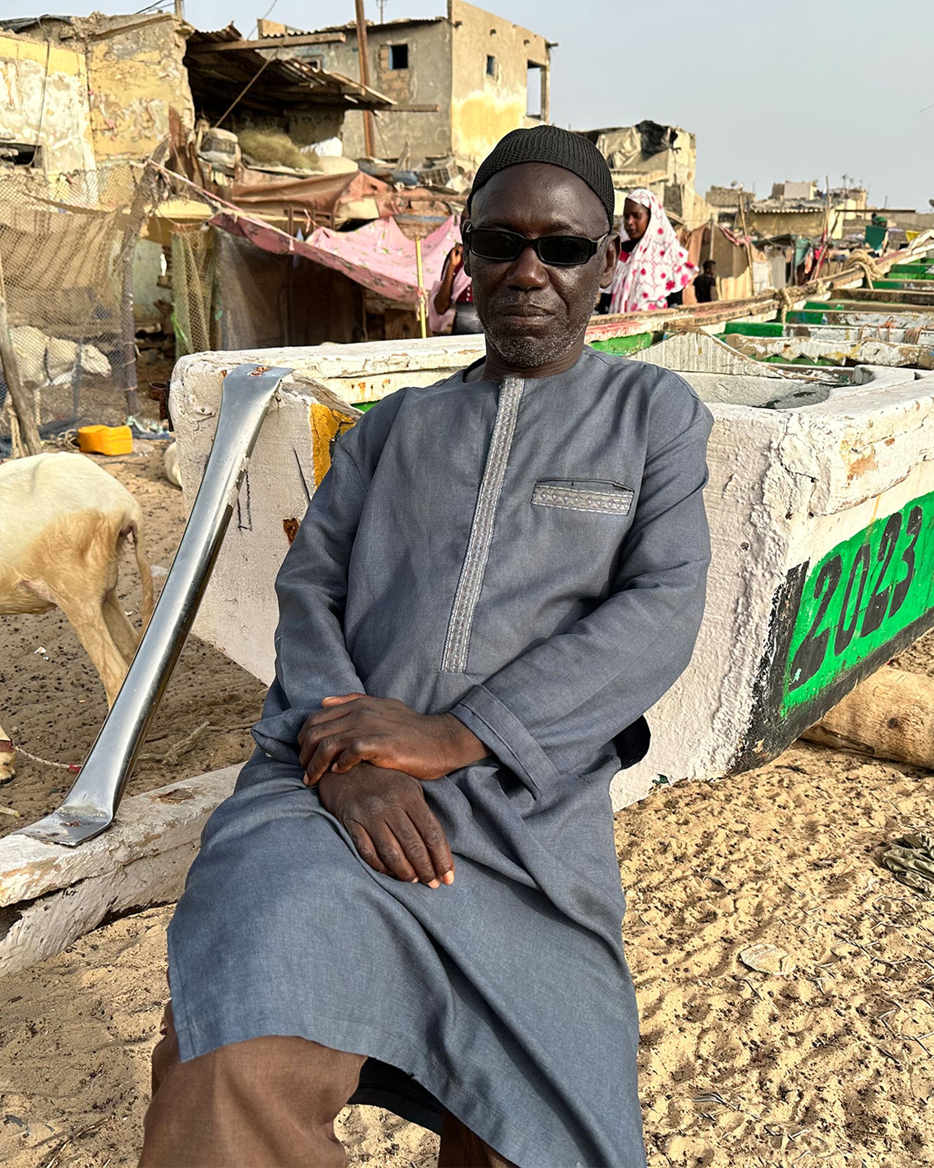Cheik Badiane, a retired fisherman in the vibrant fishing village of Guet Ndar.