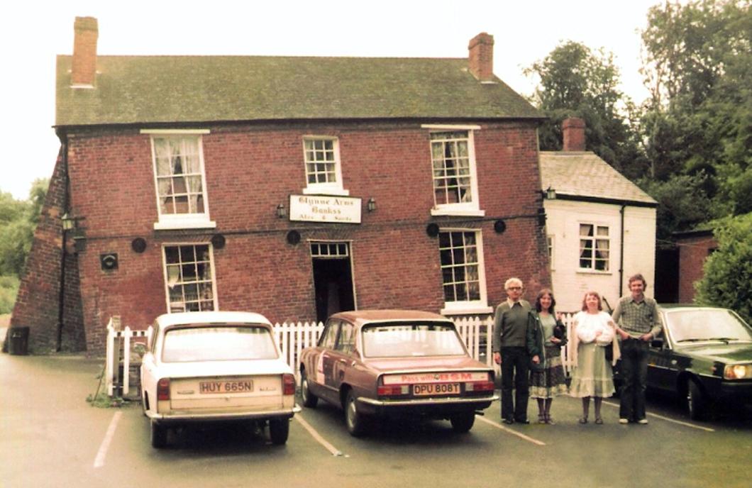A nostalgic photo of a family posing in front of the Crooked House, June 24, 1979.