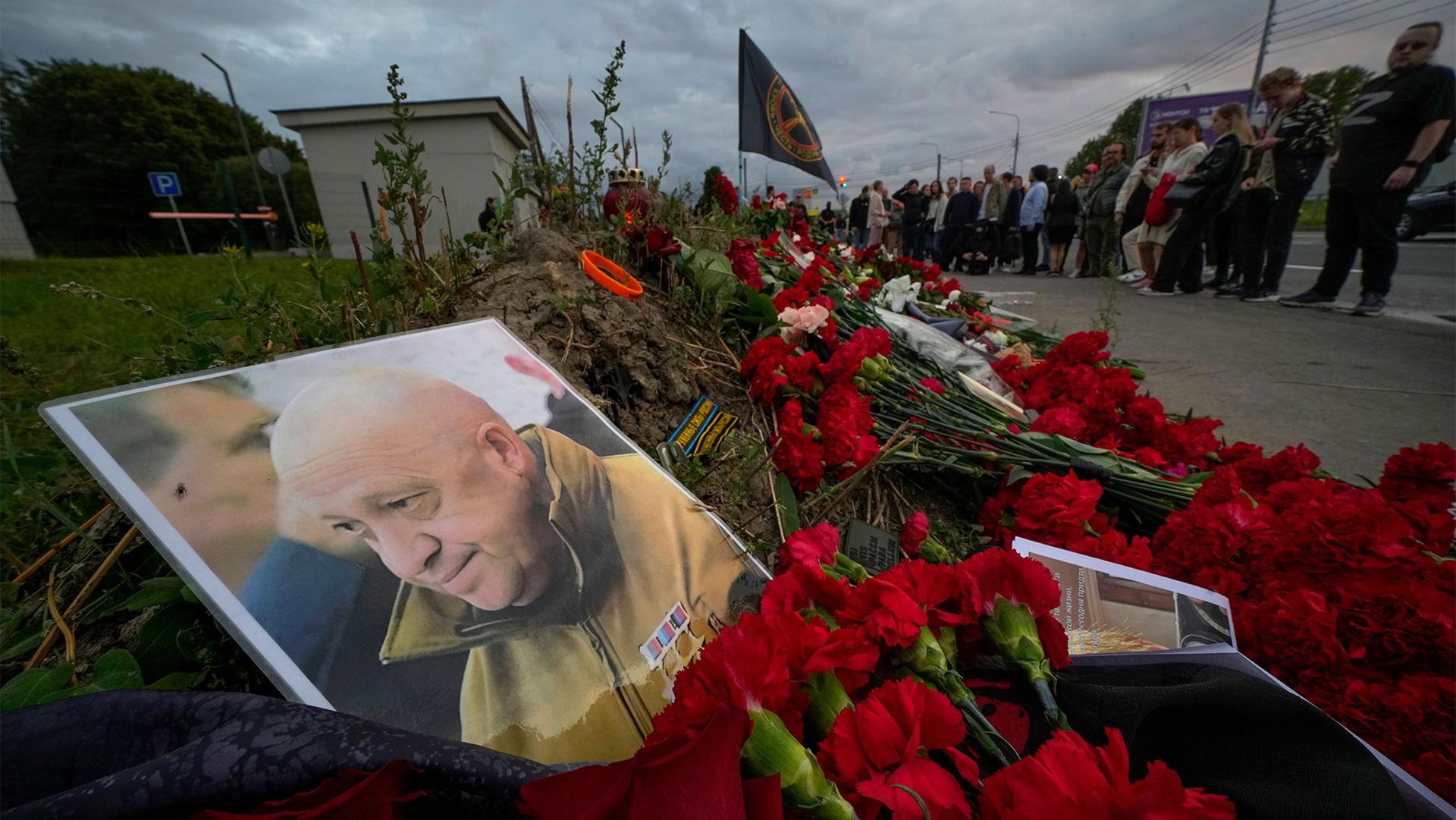 A portrait of the owner of private military company Wagner Group Yevgeny Prigozhin lays at an informal memorial next to the former 'PMC Wagner Centre' in St. Petersburg, Russia, Aug. 24, 2023.