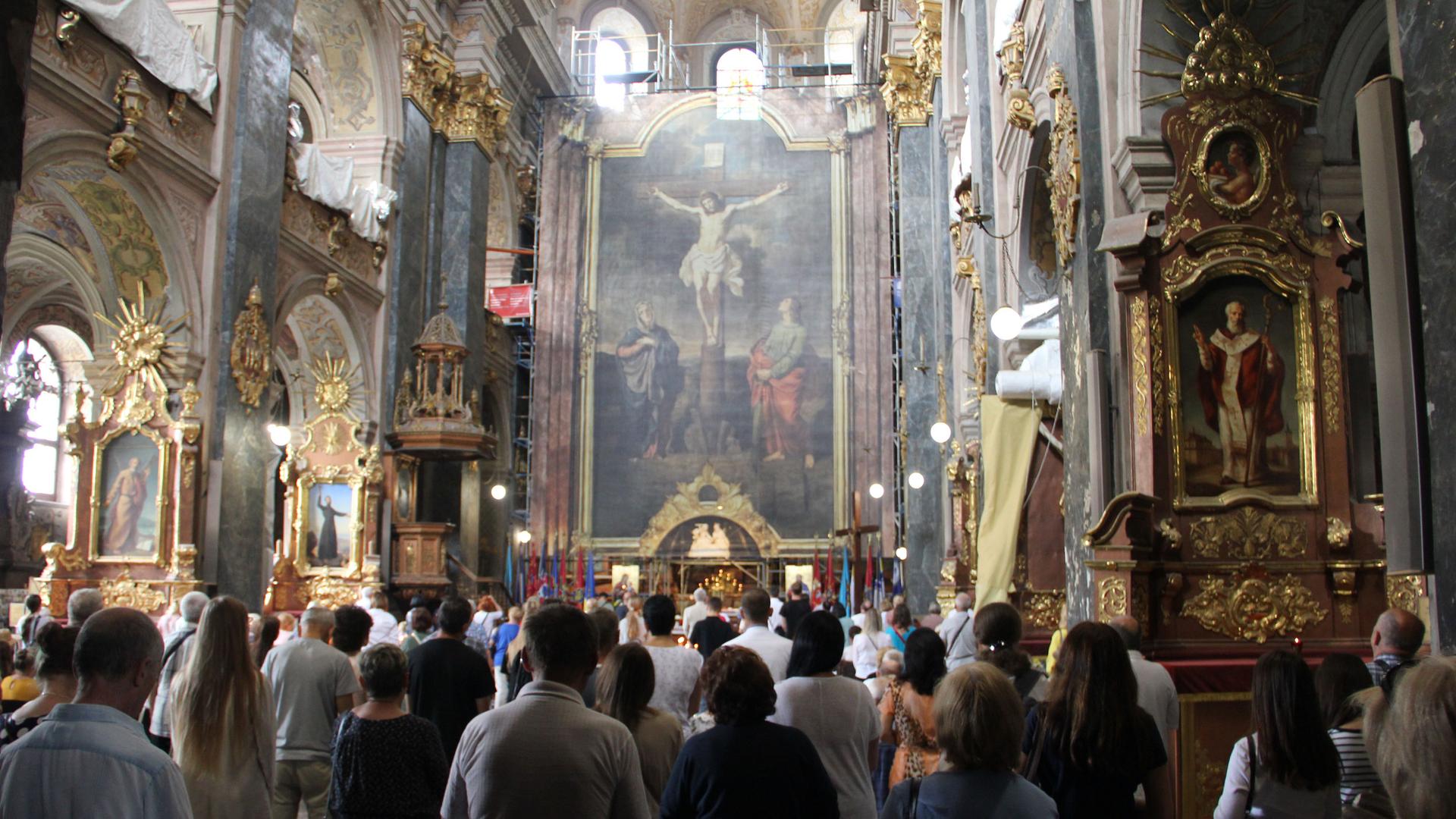 During a recent morning mass, Saints Peter and Paul Garrison Church, in Lviv, Ukraine, is packed. 