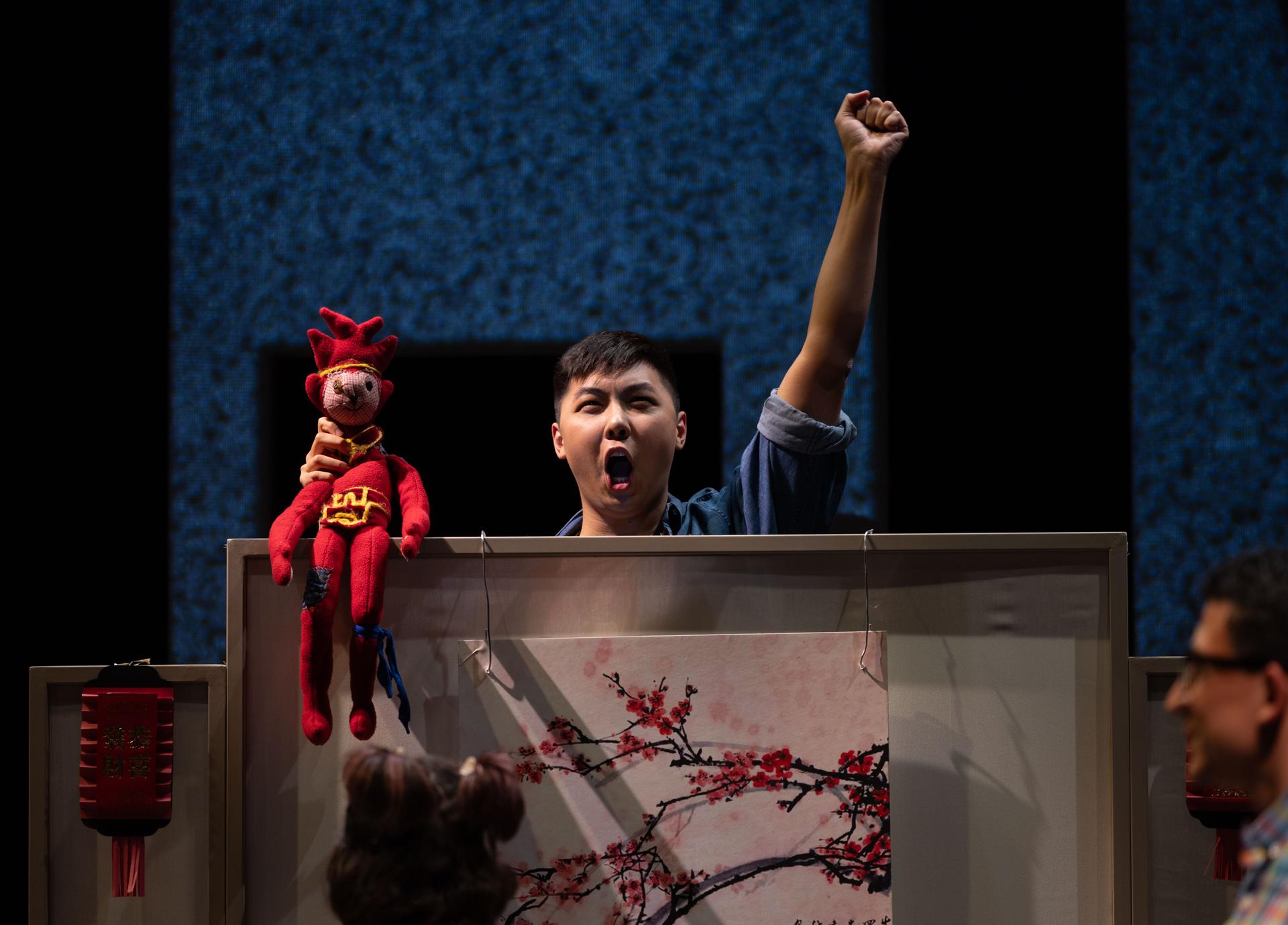 Countertenor Chuanyuan Liu performs as Monkey at the world premiere of 