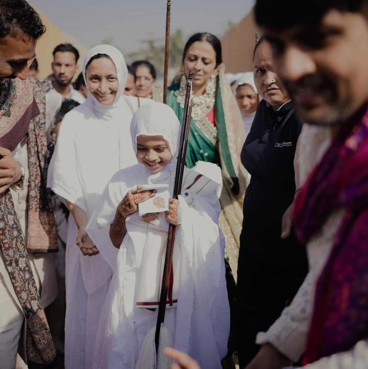 On the final day of the five-day ceremony, Devanshi Sanghvi gave up the finery for a simple white garment, had her hair shaved, bathed one last time and said her goodbyes.