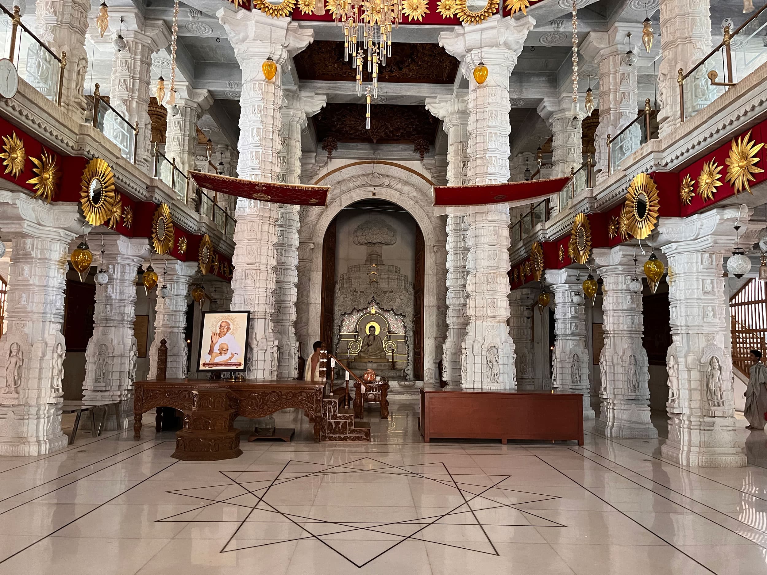 Intricate carvings adorn the marble pillars inside a Jain temple in Ahmedabad, western India. Jainism is an ancient religion whose followers often renounce the world to lead a life of extreme austerity. Most of them are women, some as young as 8.