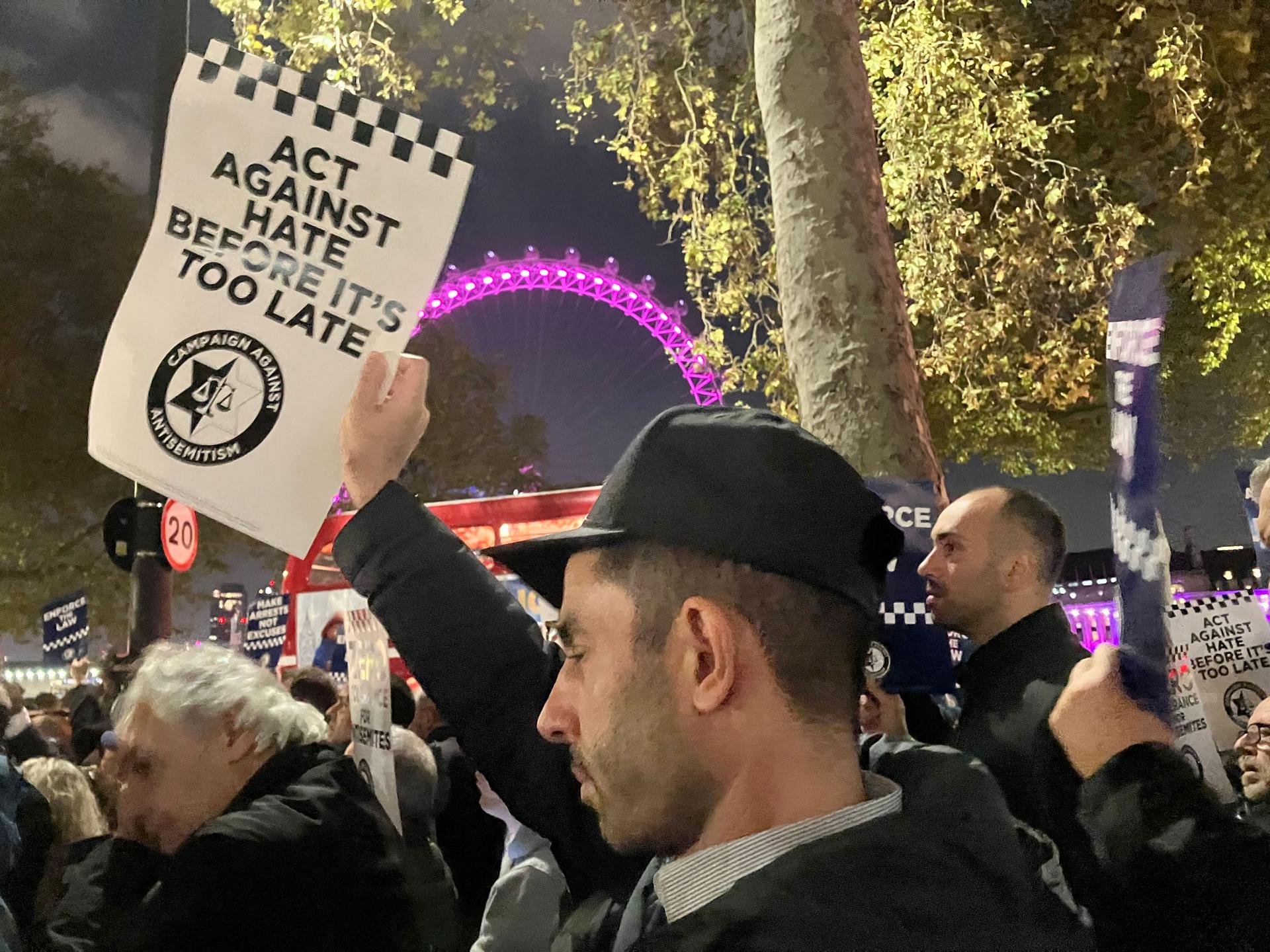 Hundreds gather at a rally outside New Scotland Yard demanding police to do more to protect London's Jewish citizens.