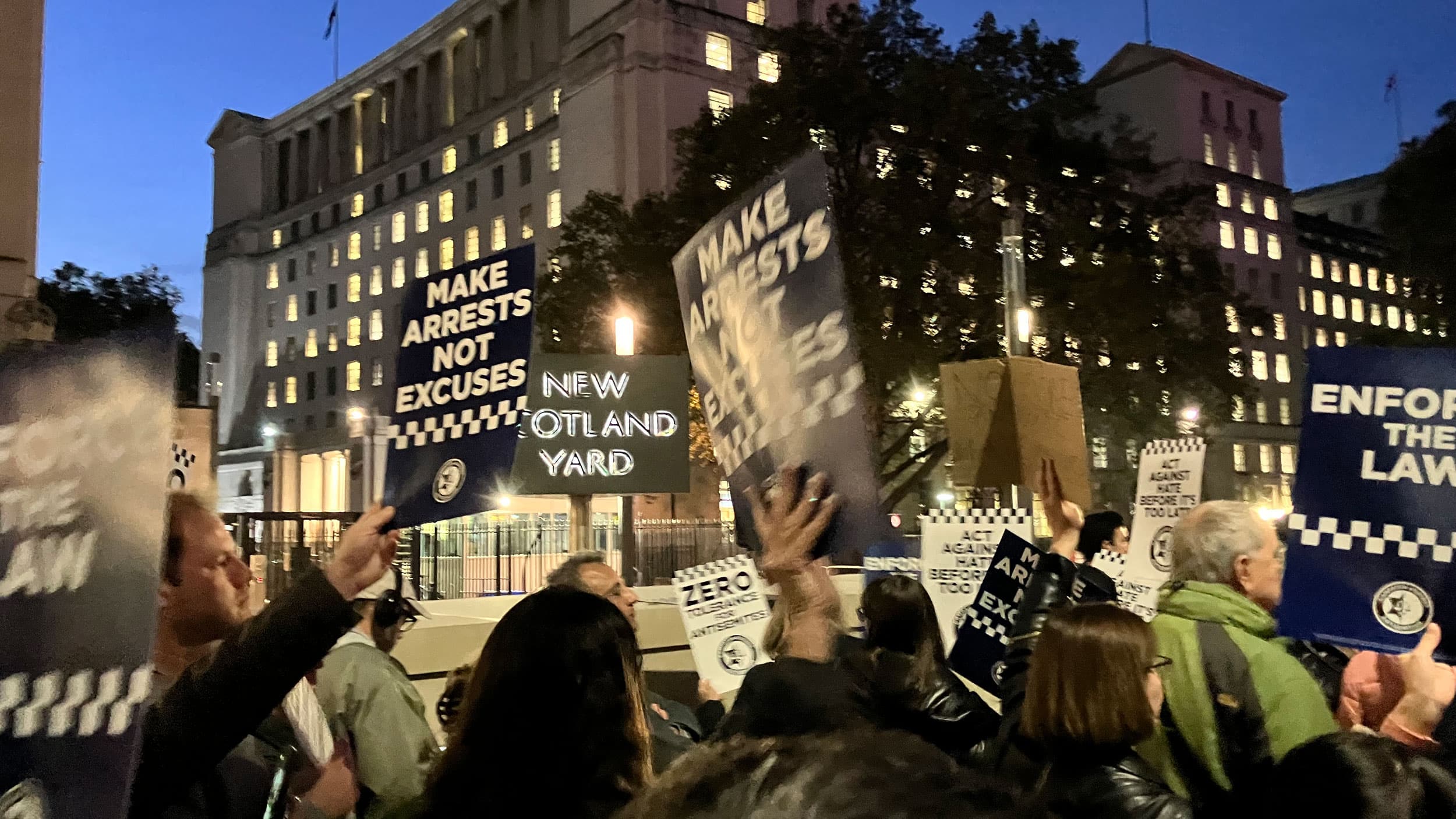Hundreds gather at a rally outside New Scotland Yard demanding police to do more to protect London's Jewish citizens.