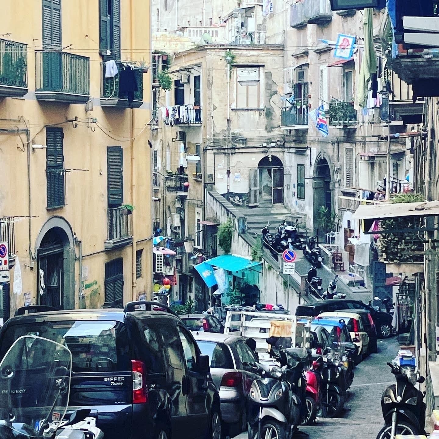 A bustling street in Naples, Italy, July 2023.
