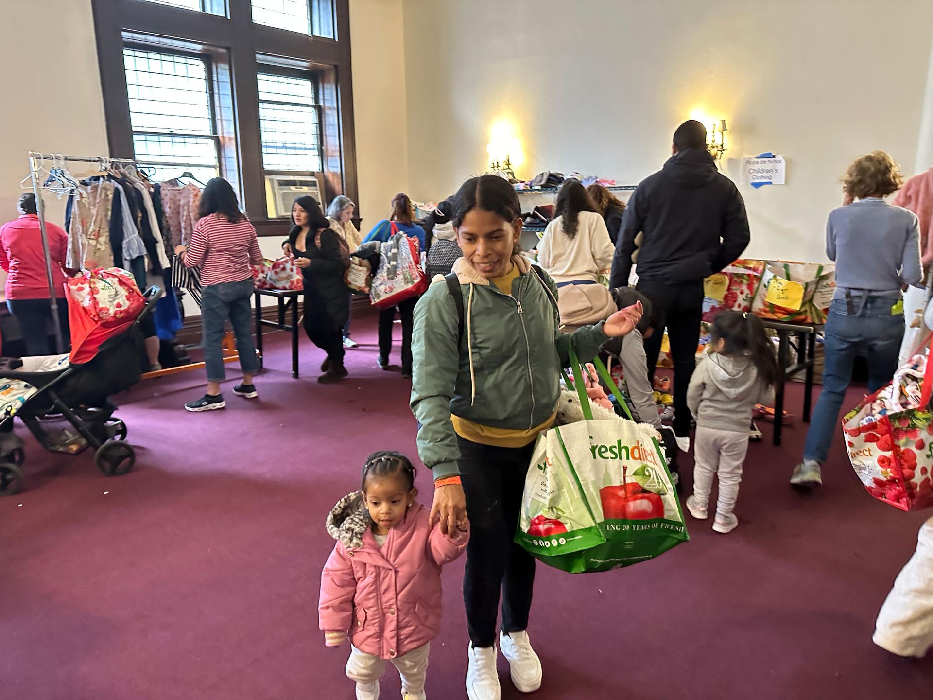 About 200 immigrants come to St. Paul and St. Andrew every week to get clothes, food, toys and diapers.