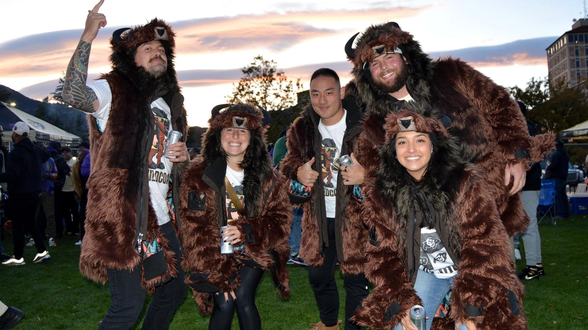 College students wearing bear costumes