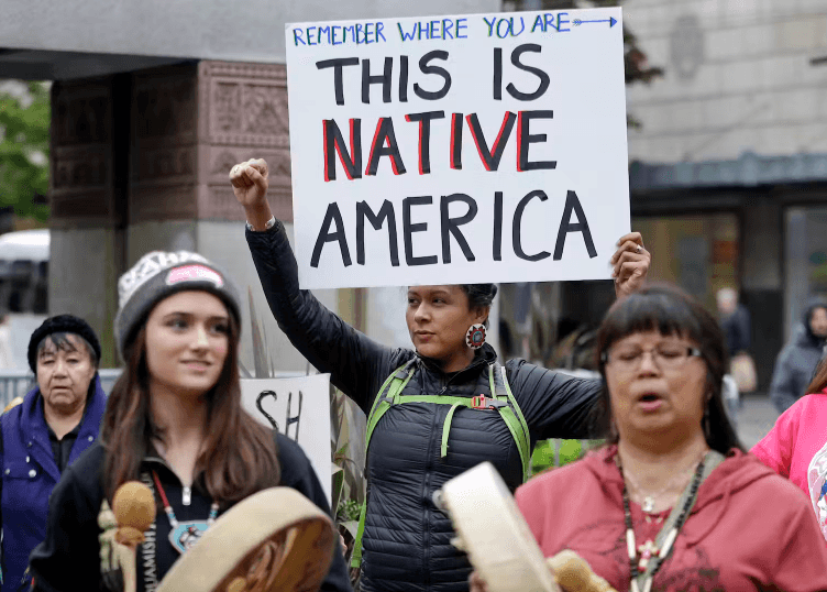 Native Americans and their allies hold a demonstration for Indigenous Peoples Day in Seattle, 2015.