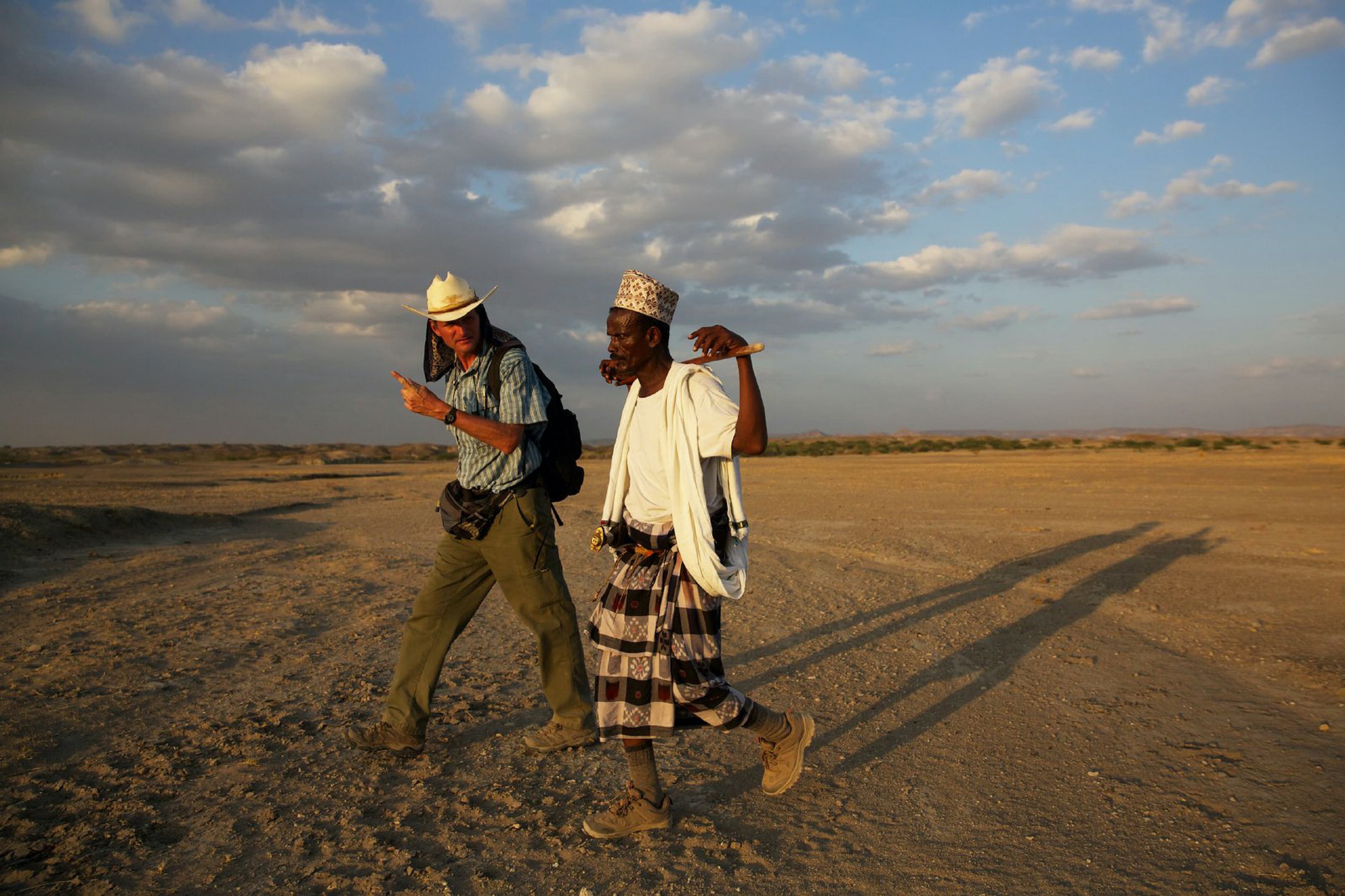 two men in the field