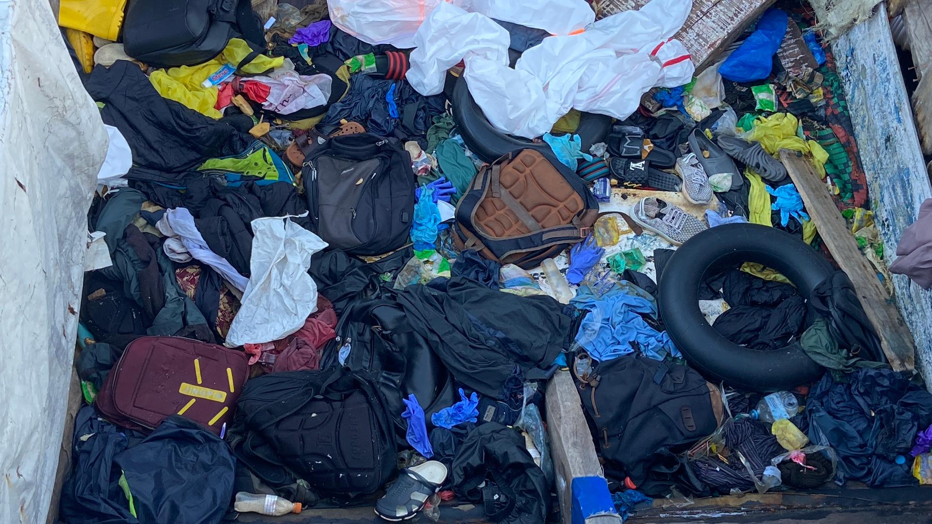 trash found in a boat from migrants