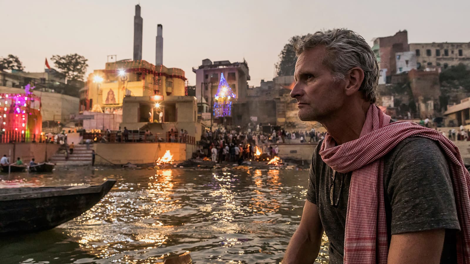 man in front of river